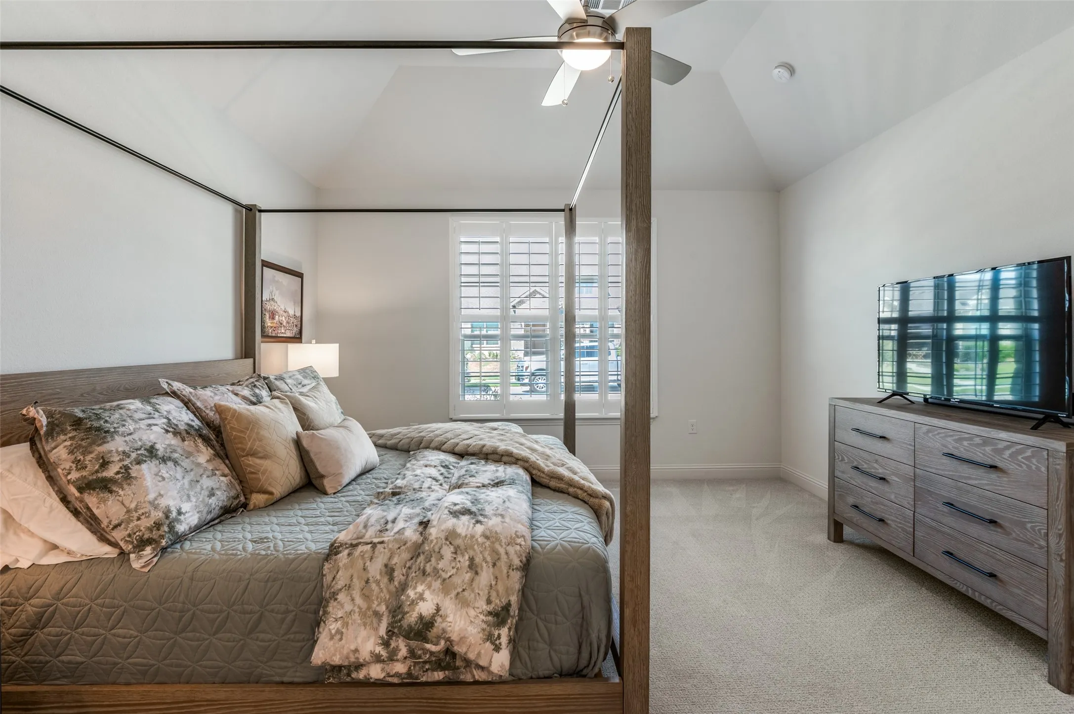 Another view of the primary suite showcasing the generous layout and elegant design, with ample space for additional furnishings.