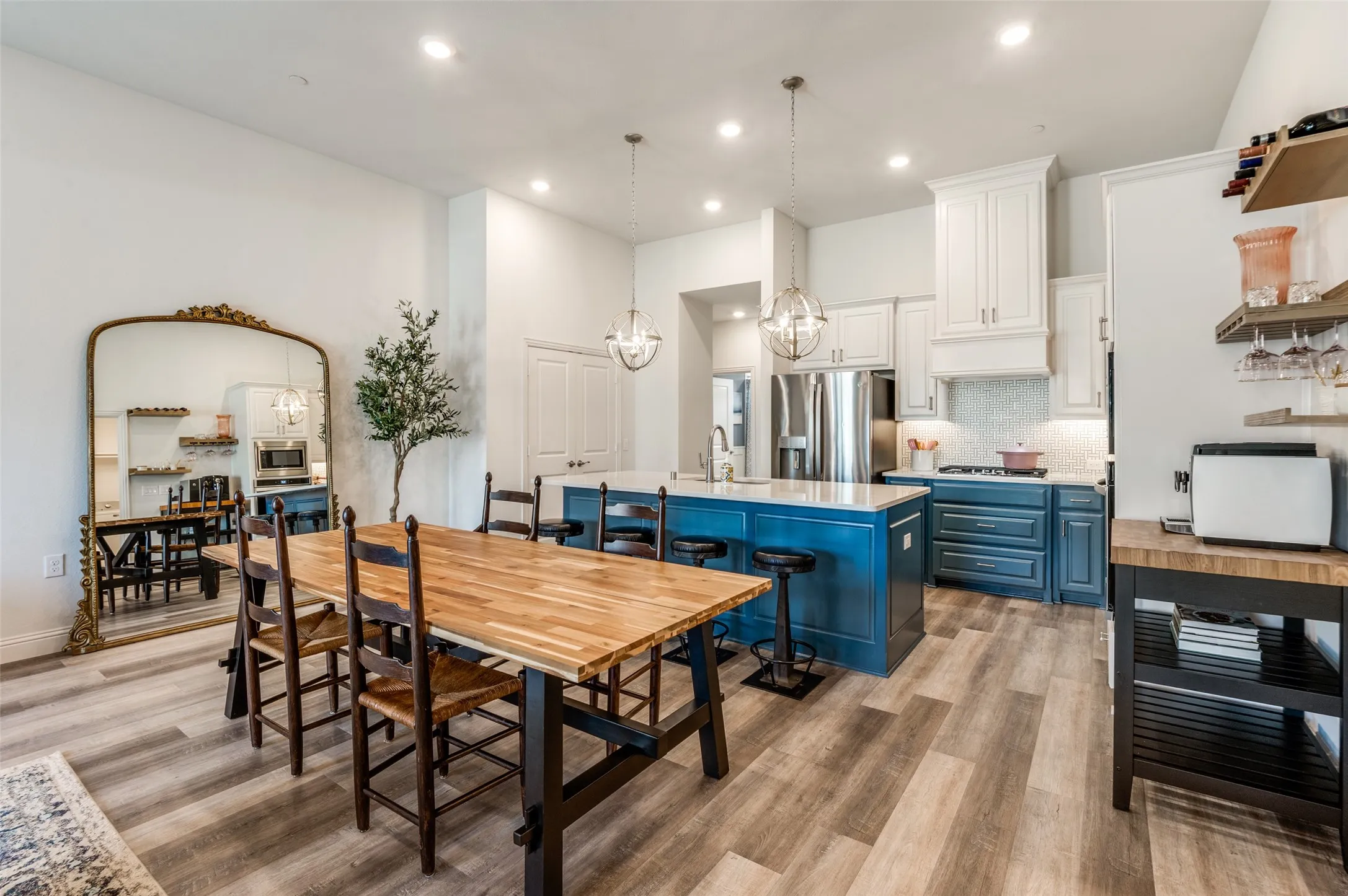 Generous dining space with room for a large table, perfectly positioned next to the kitchen for effortless hosting and gatherings.