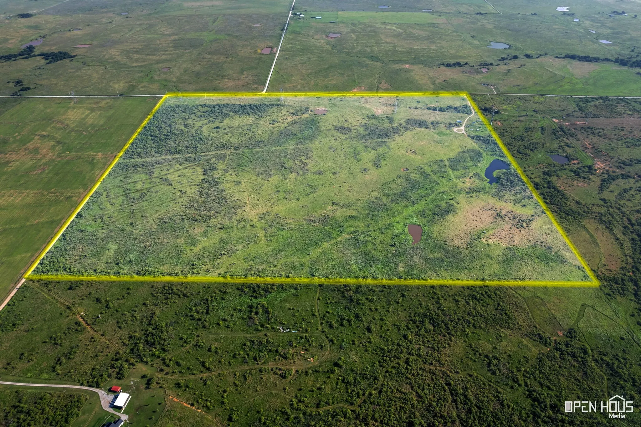 Overview of rural landscape featuring property boundaries highlighted