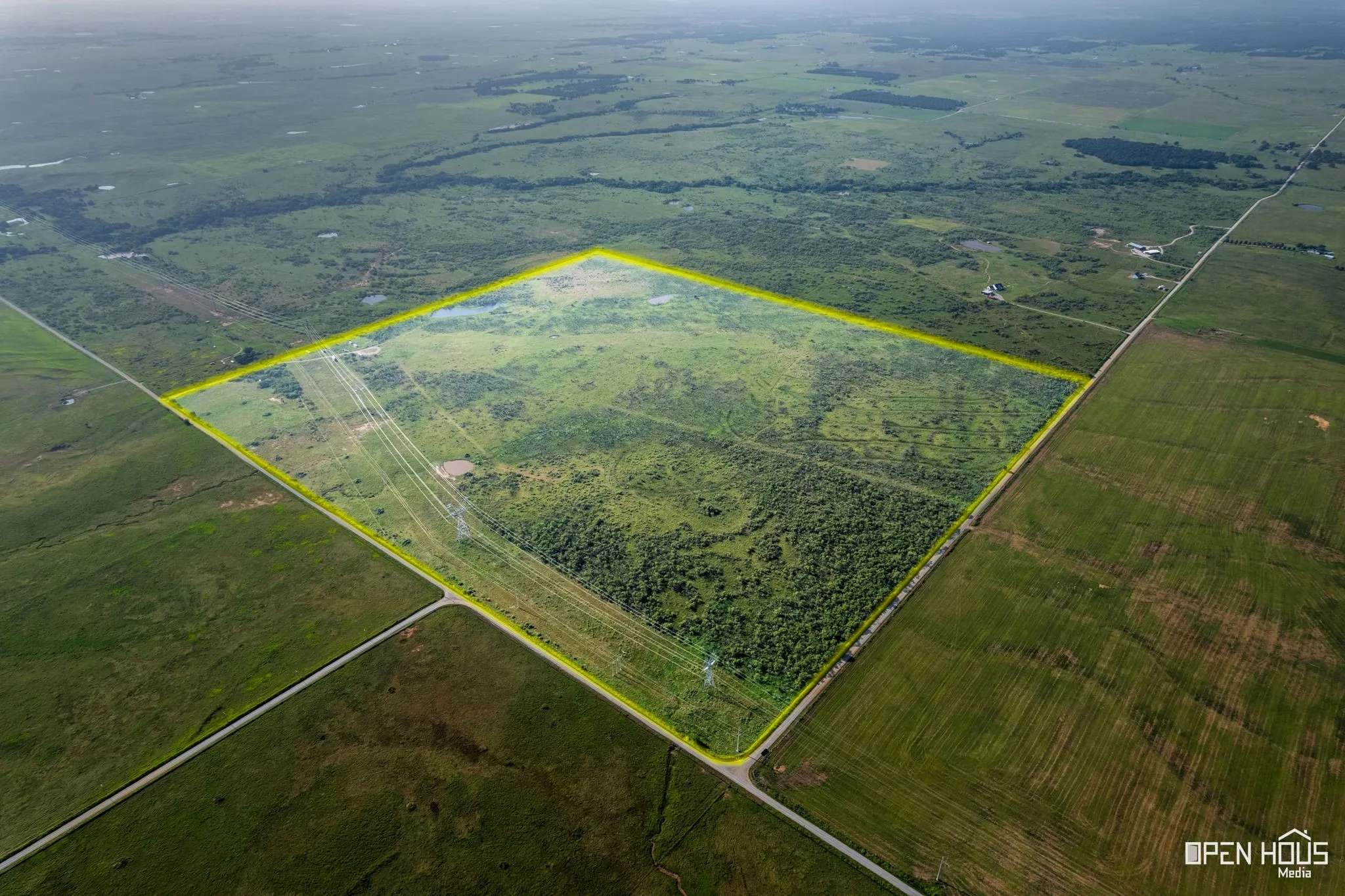 Overview of rural landscape featuring property parcel outlined