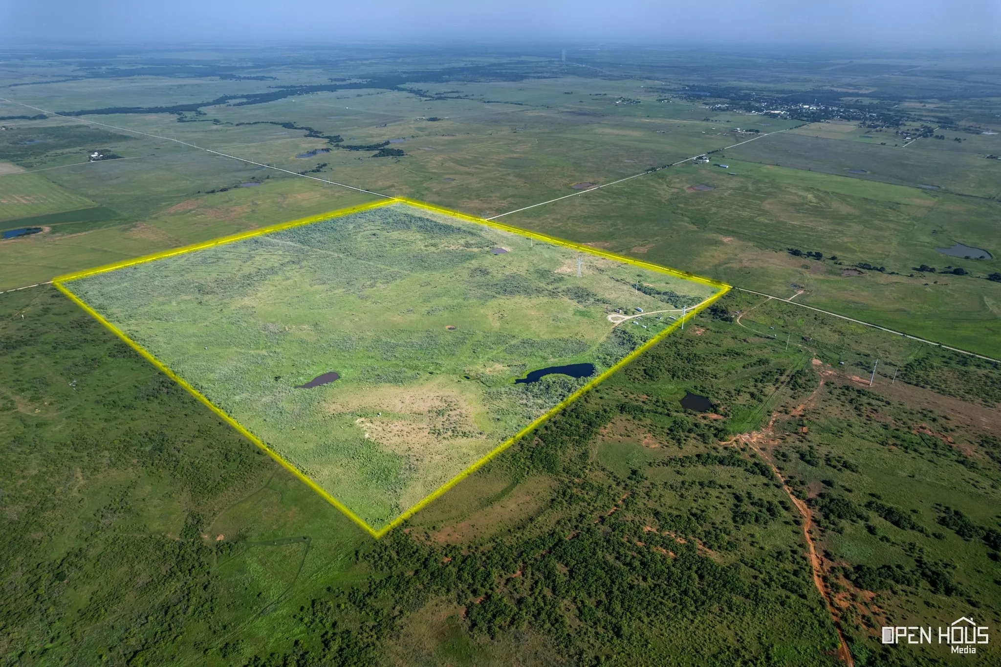 Overview of rural landscape with property parcel outlined