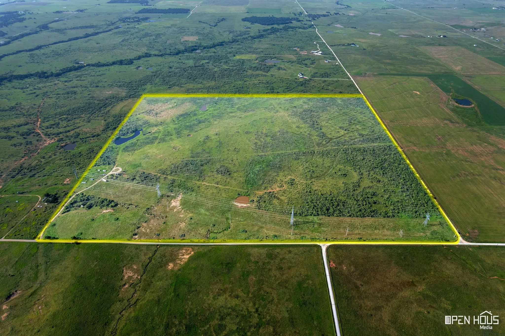 Overview of rural landscape featuring property boundaries highlighted