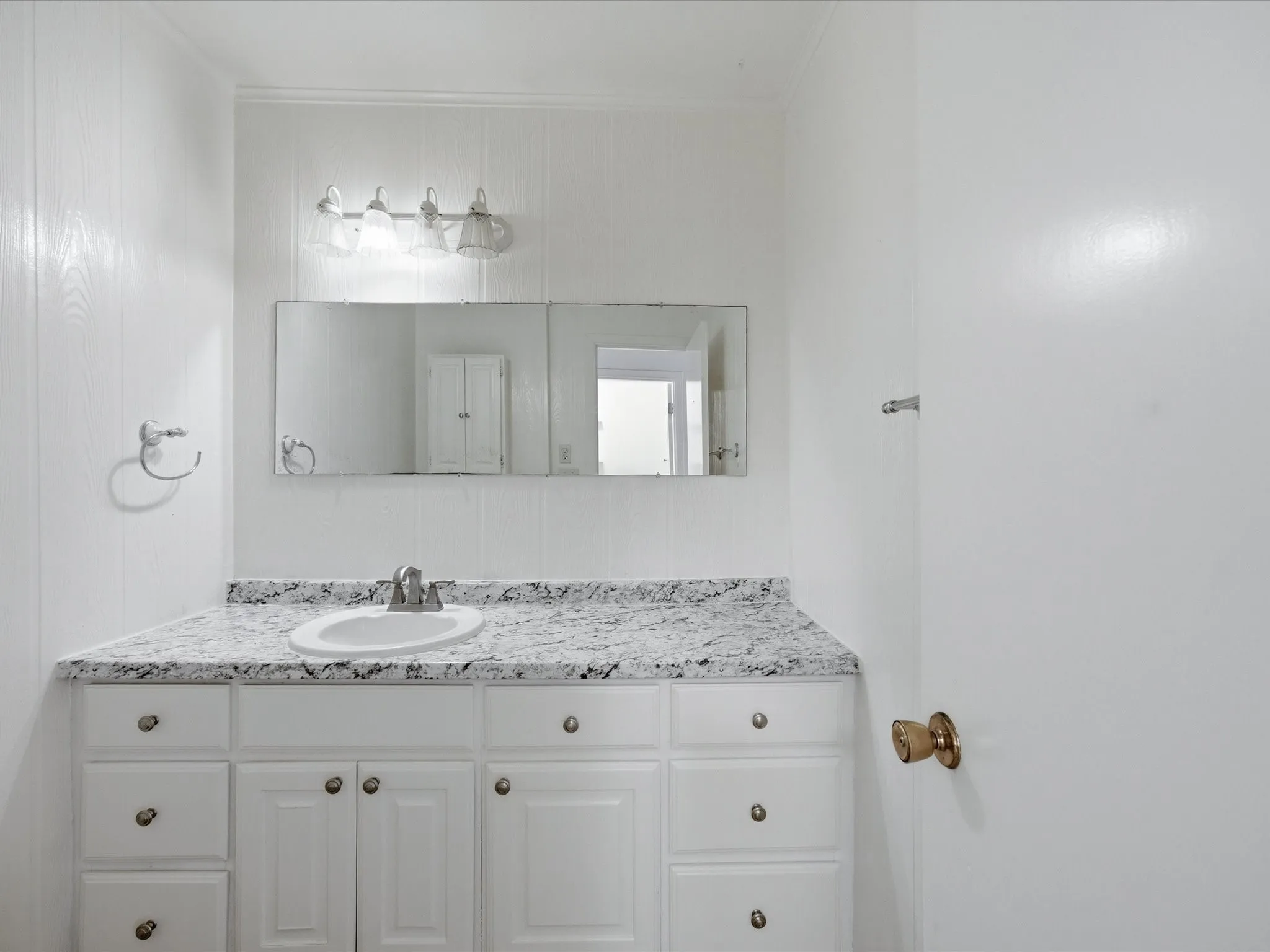 Bathroom featuring vanity