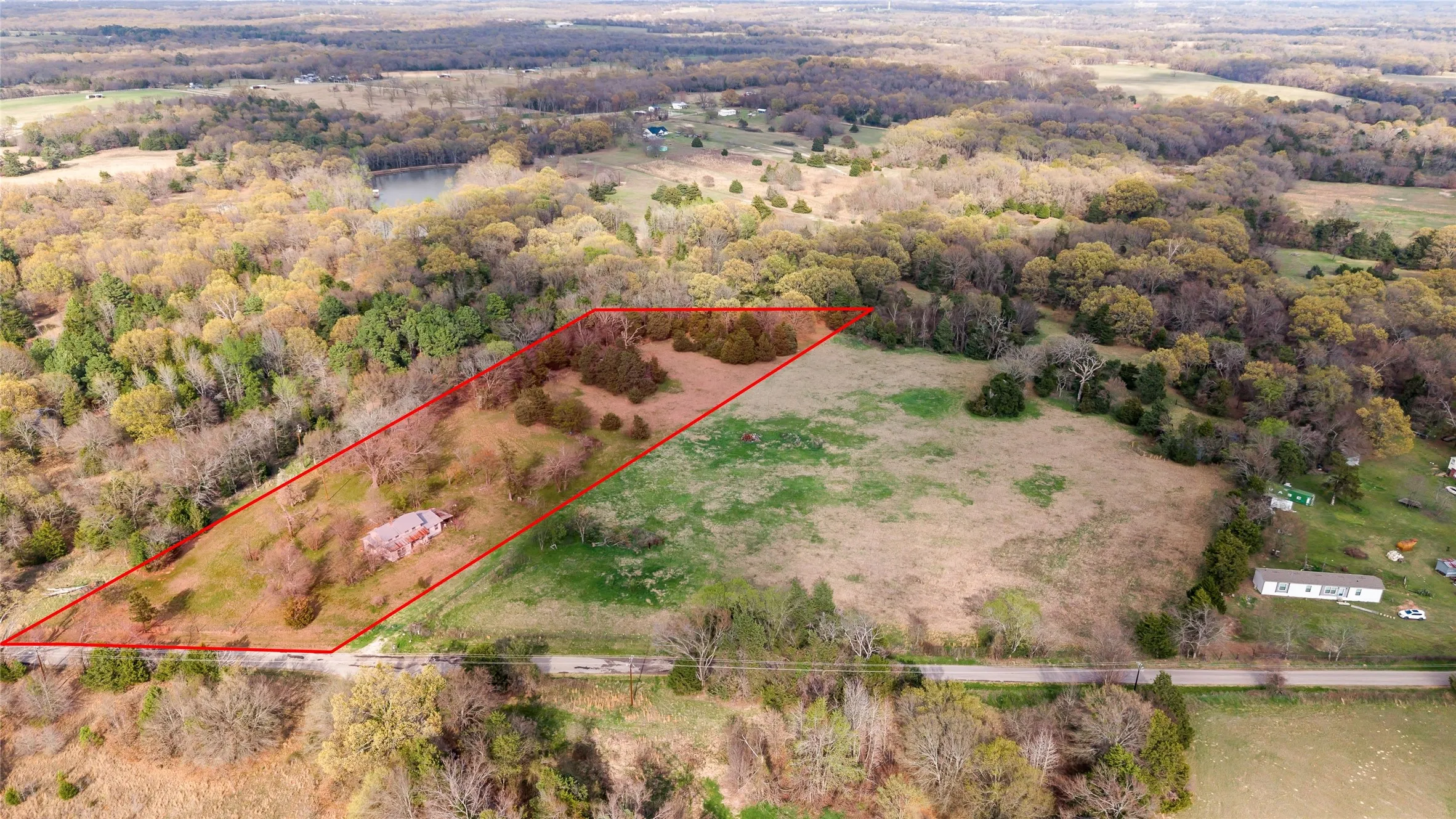 Overview of rural landscape featuring property parcel outlined