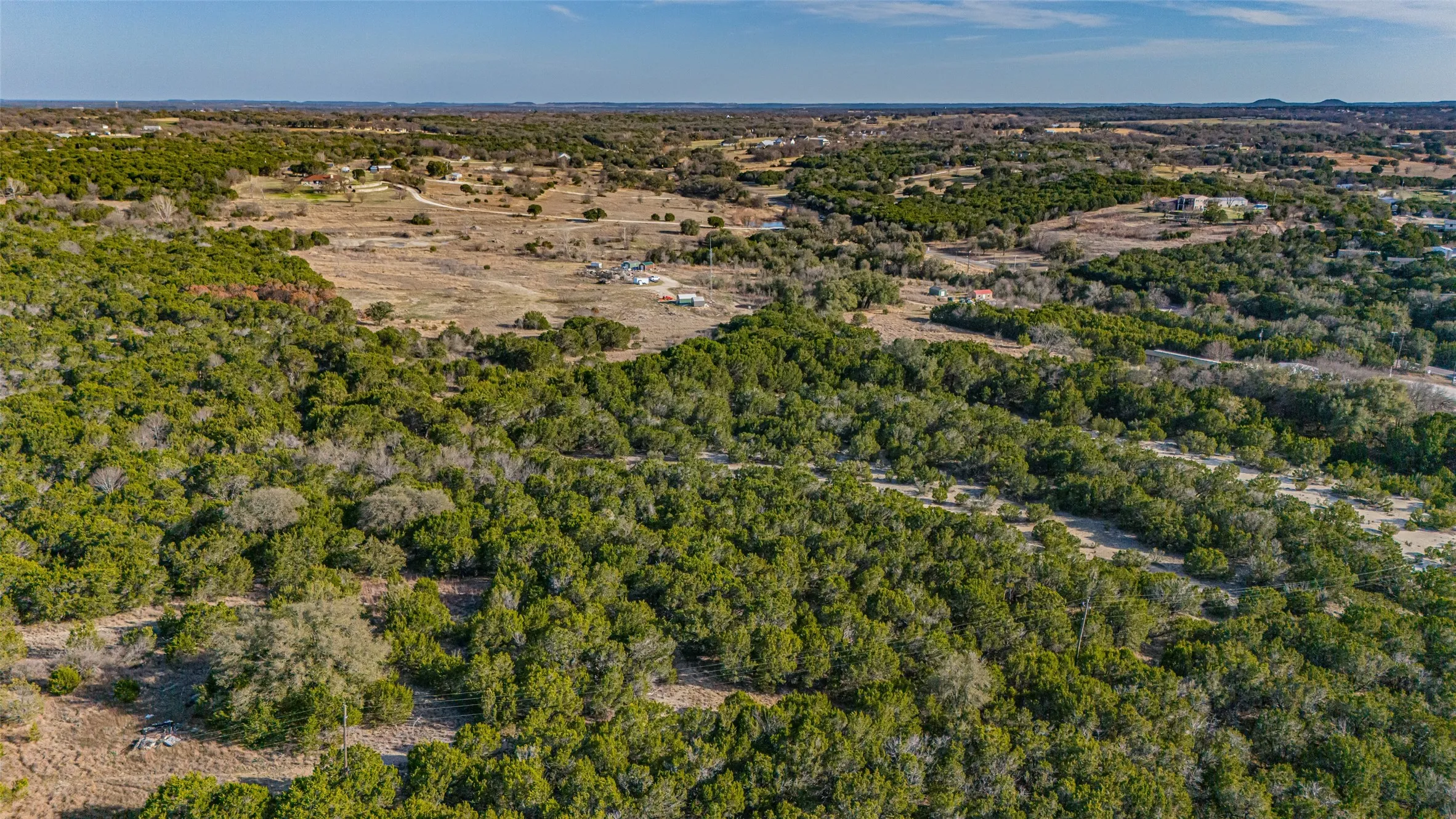 Aerial view of a heavily wooded area