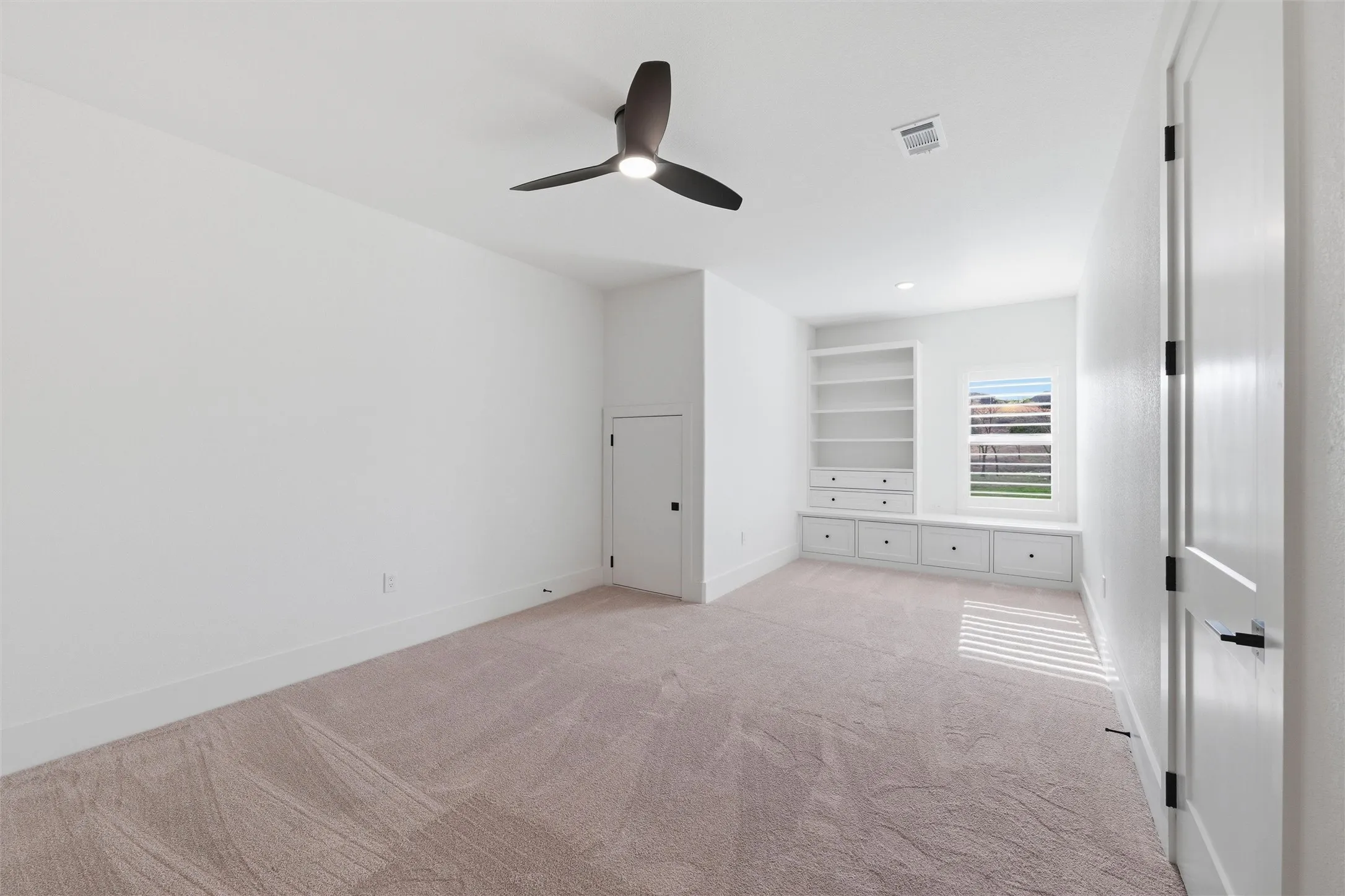 Large secondary suite with ensuite and built ins
