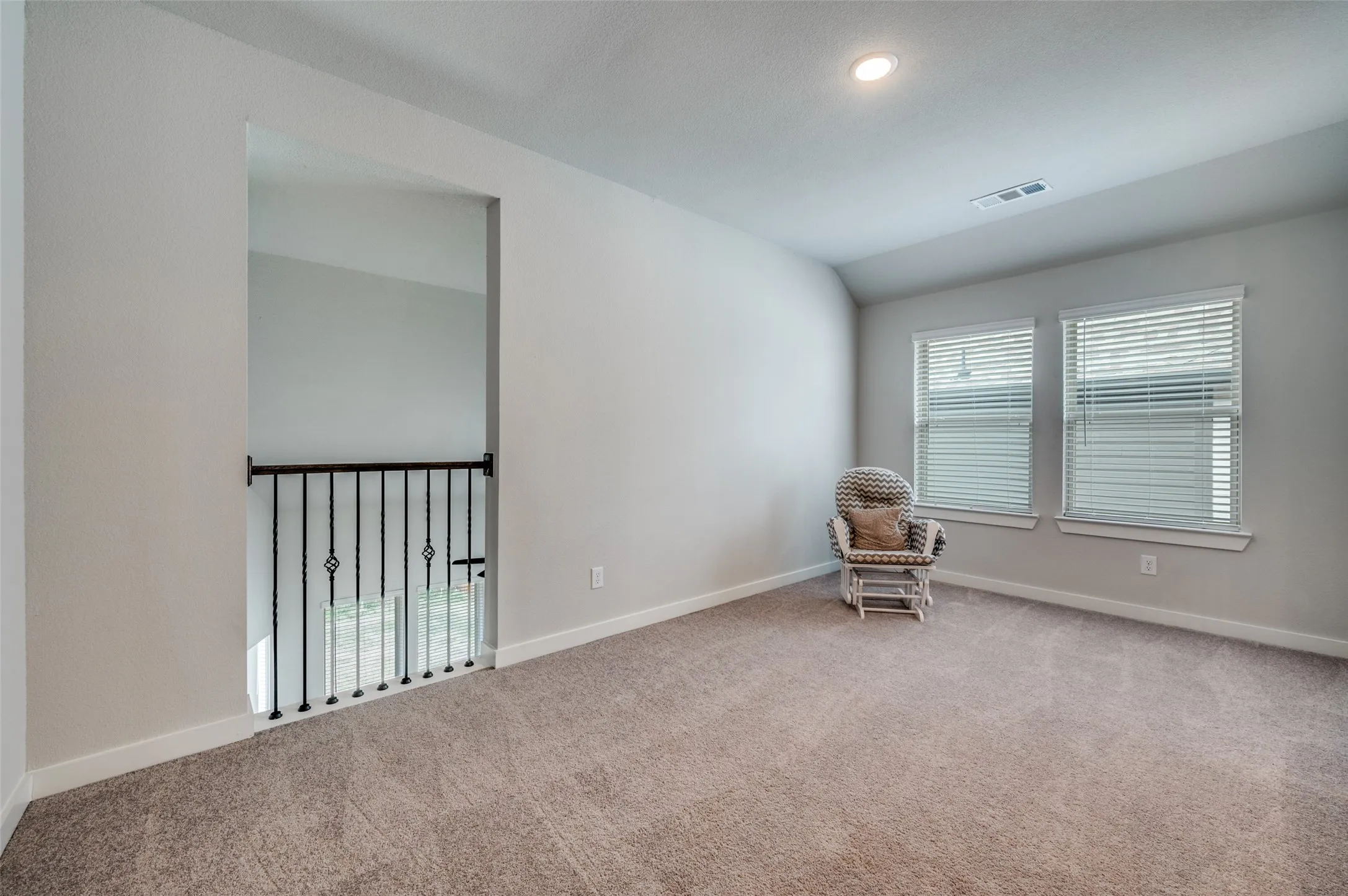 Game room overlooking the living room