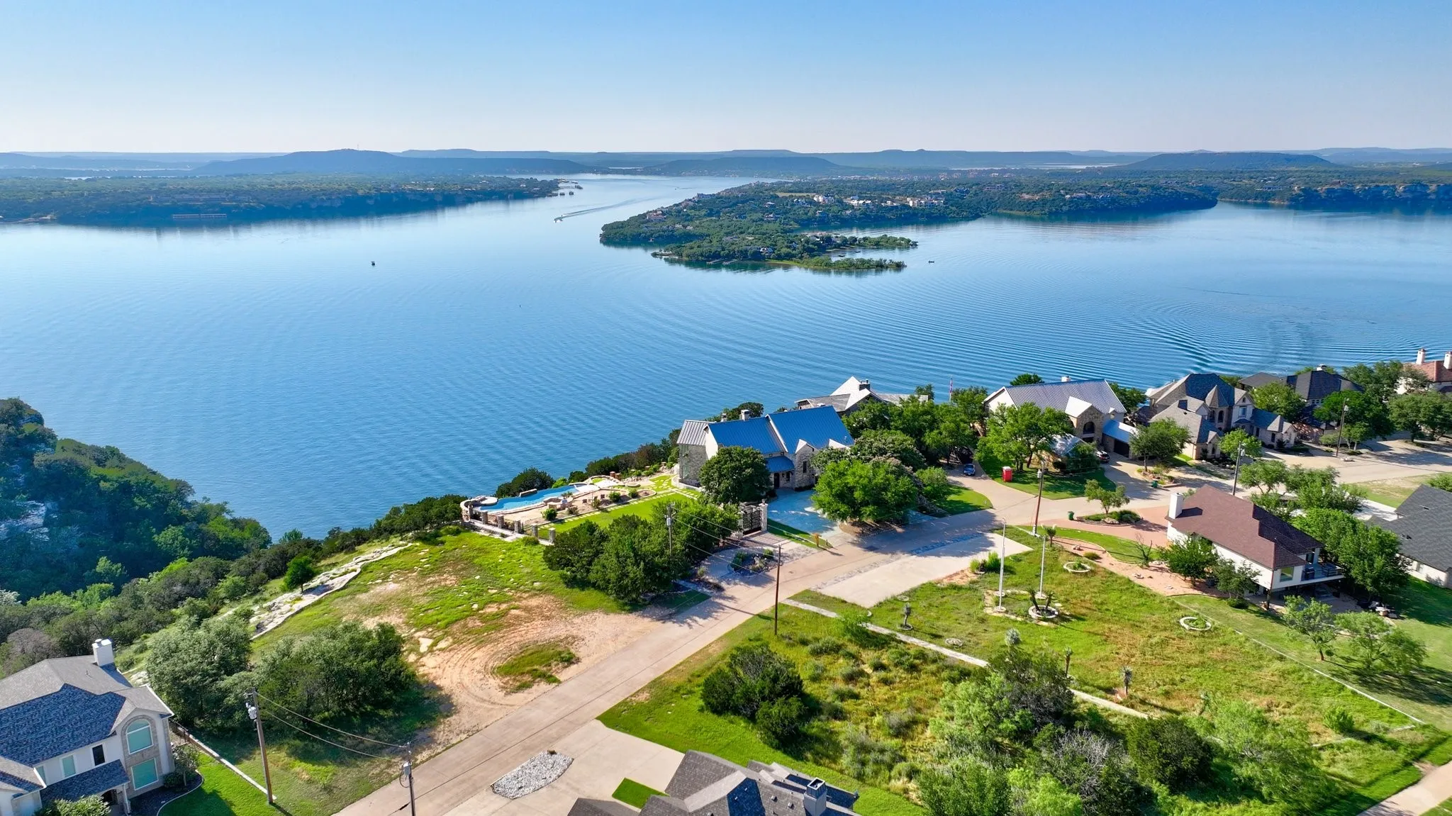 Single Family Residence For Sale in Palo Pinto County , 175 Bay Hill Drive, Possum Kingdom Lake, Texas 76449, 5 Bedrooms, 4 Bathrooms, 2 Garage spaces, 5,620 Sqft, built in 1997, Preowned, Price $2,999,999, mls#21195426, Real Estate Agent in Possum Kingdom Lake, Homes For Sale in Palo Pinto county, Homes For Sale in Possum Kingdom Lake, Realtor in Possum Kingdom Lake Texas, Real Estate Brokerage Independent Realty Texas, Luminita Cordes Realtor