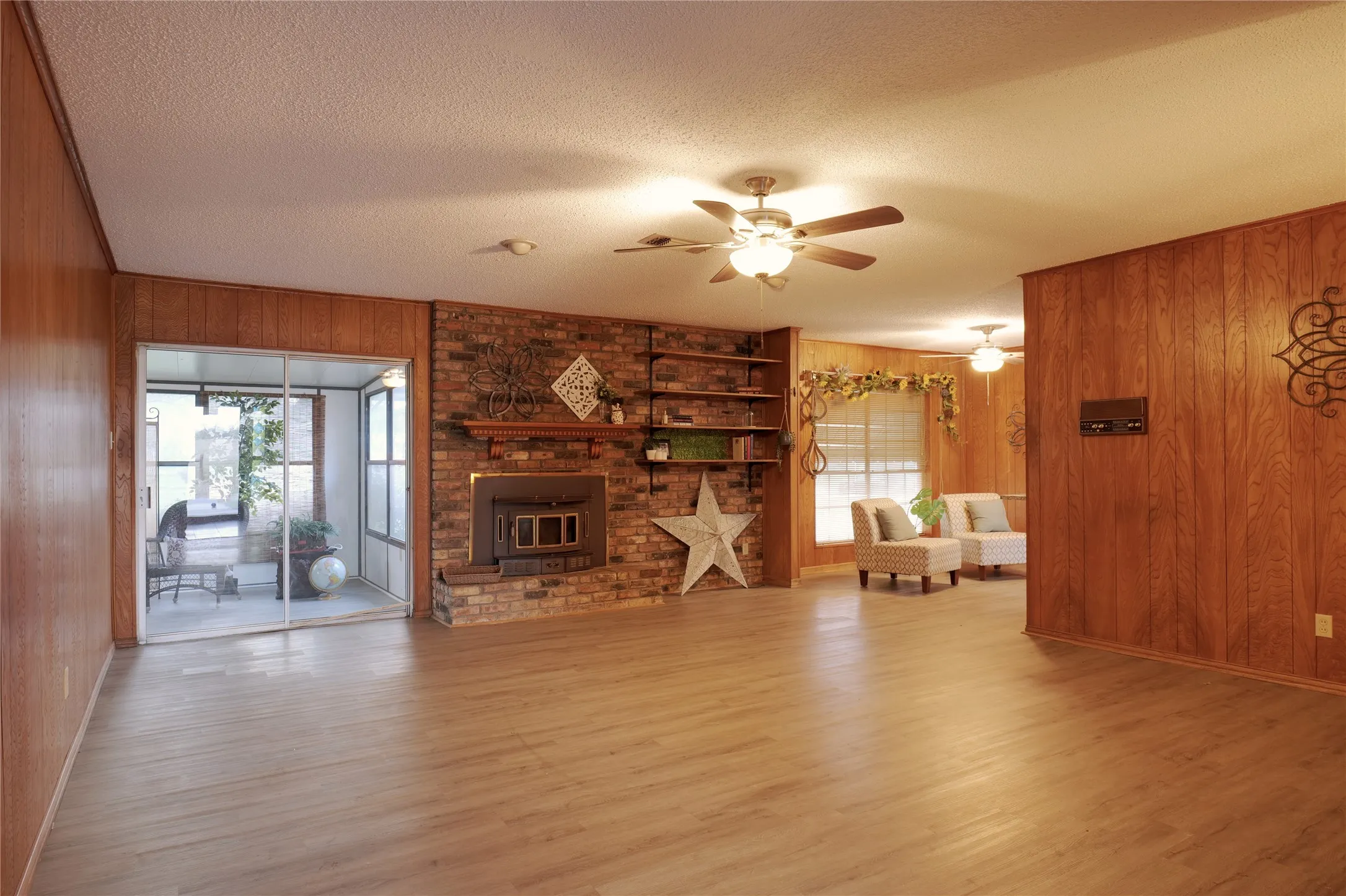 Spacious living room with a fireplace.