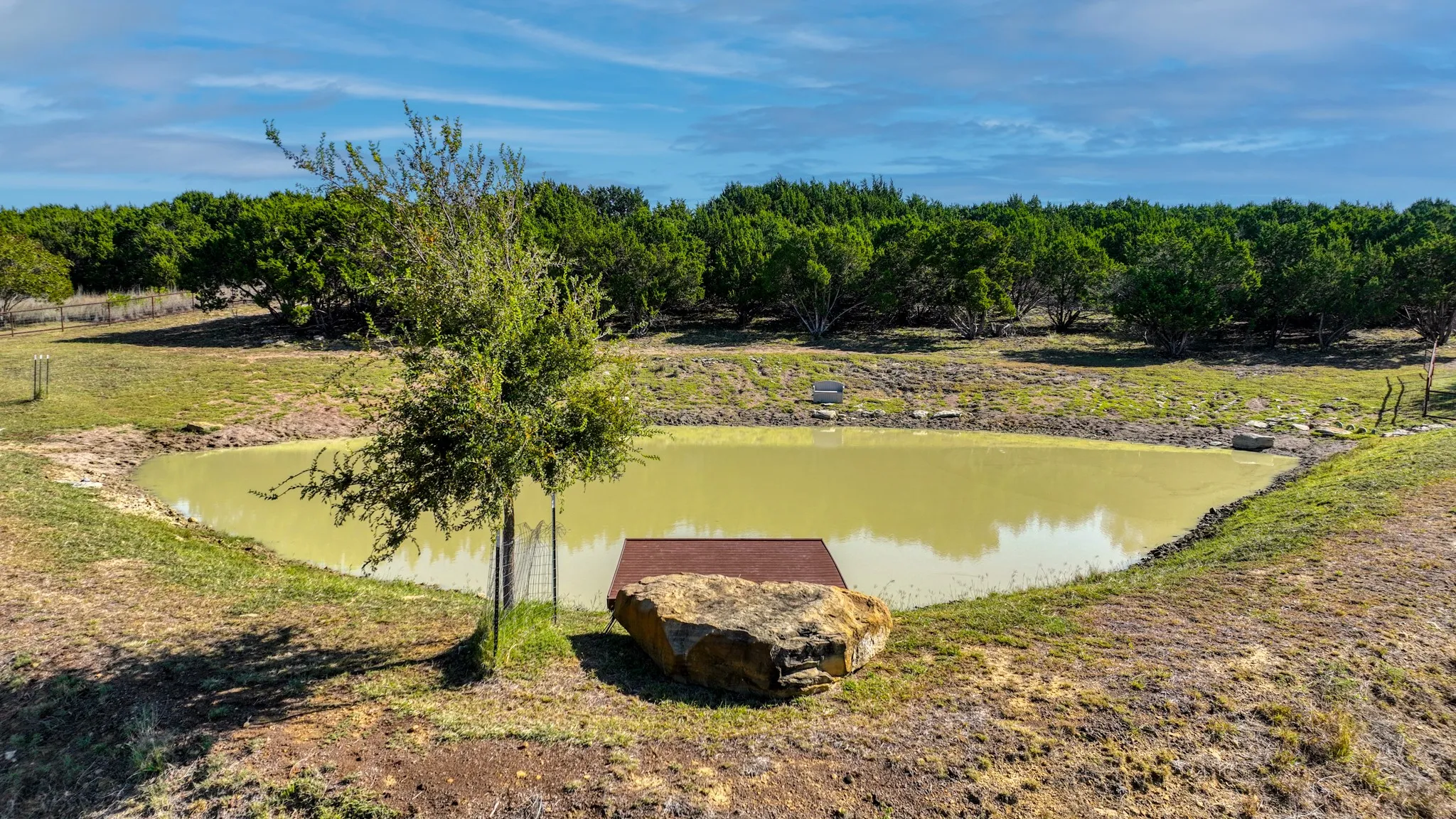 The dock on the pond has a pipe metal base and TREX boards and is a great place to sit and feed the fish and enjoy the sights and sounds of nature all around.