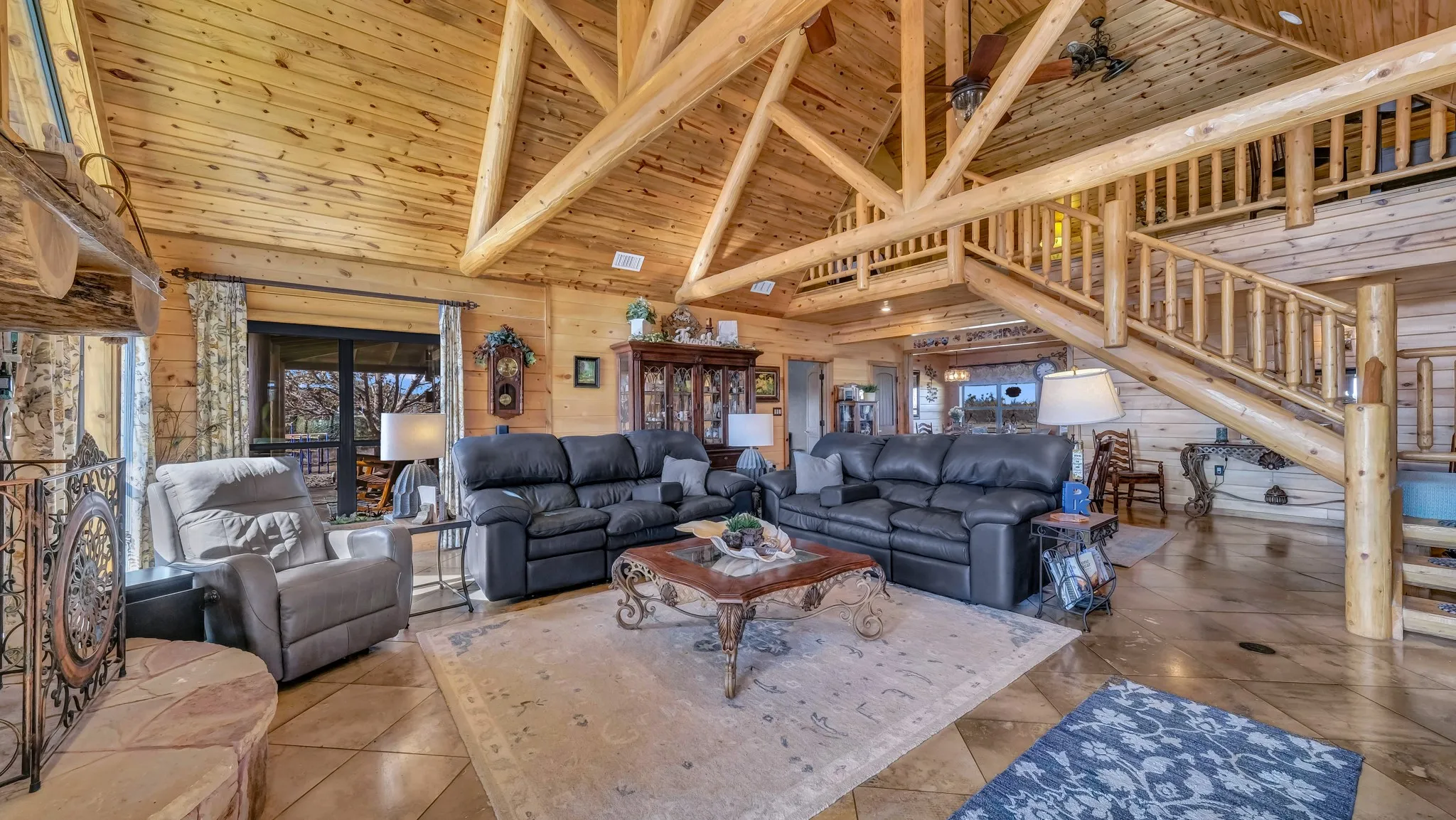 What you see when you walk in the front door.  Stunning array of woods and textiles.  Blue pine ceilings, aspen walls, spruce handmade staircase, travertine floors, to name a few.