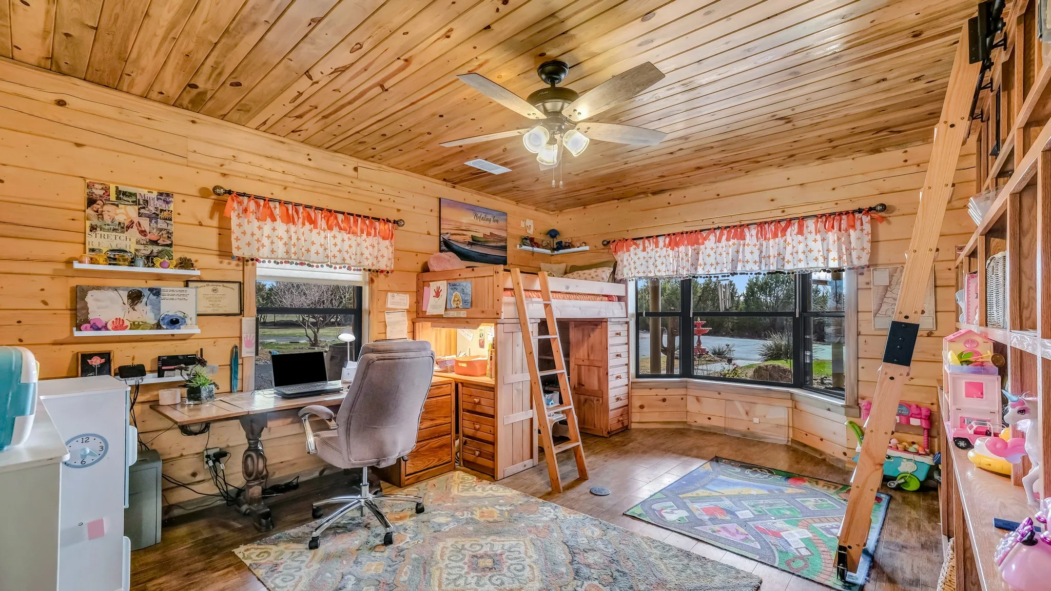 4th bedroom or office is currently being used for a combination of both.  Notice the large bay window and the blue pine ceilings and aspen walls.