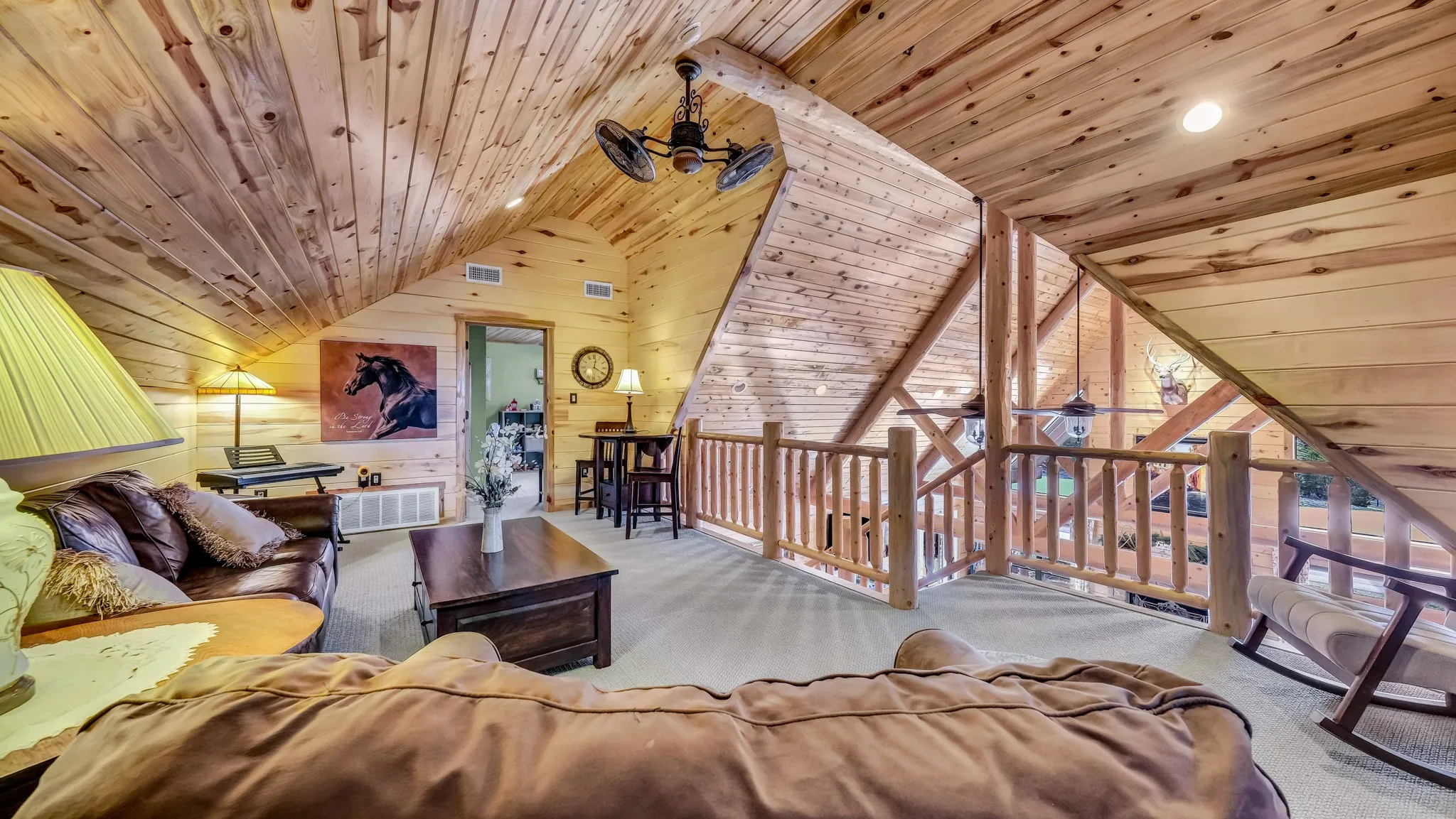 Living area upstairs between the two bedrooms.