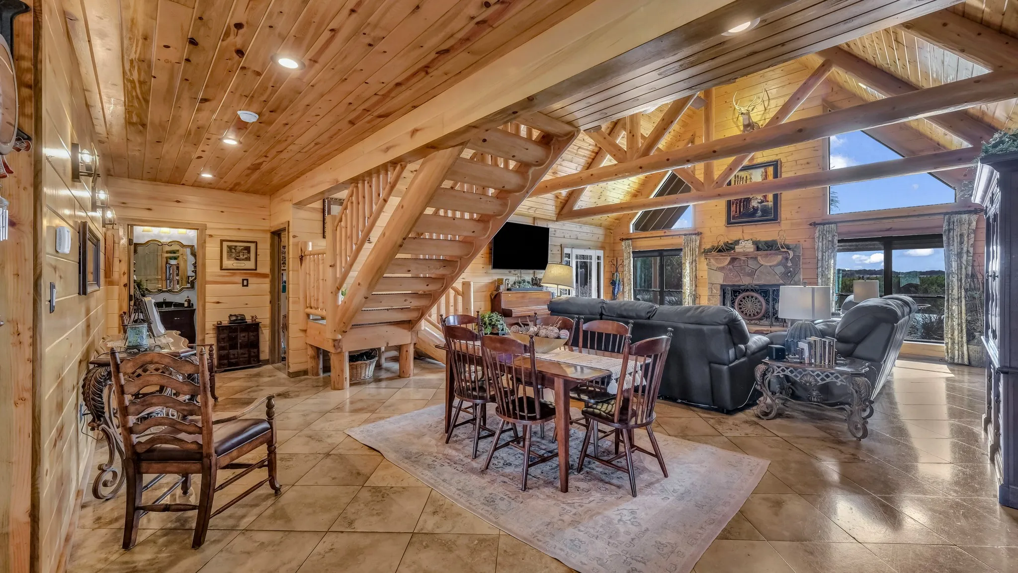 View from the dining area by the kitchen.  Lots of open spaces and tall ceilings.