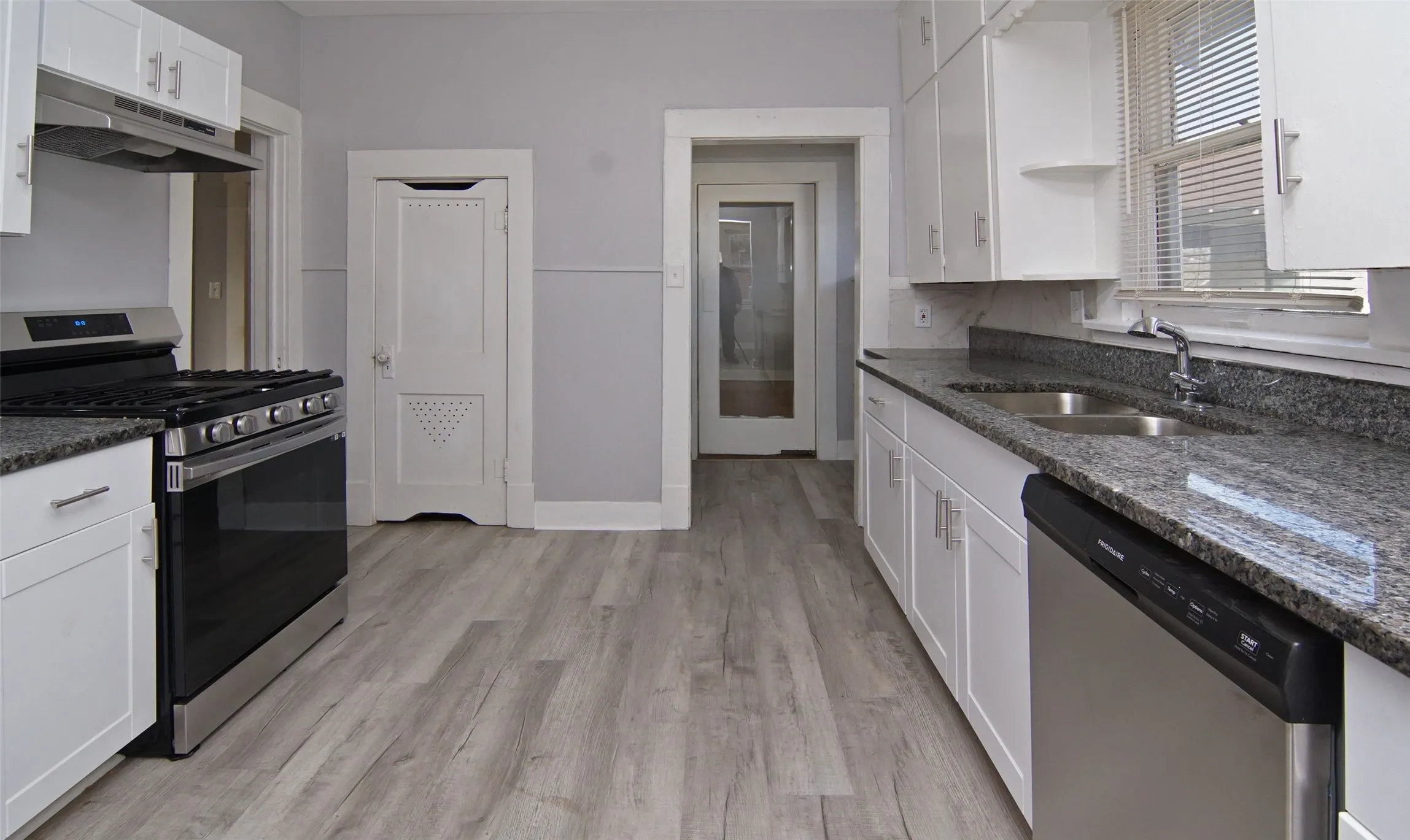 Updated with granite countertops, gas stove