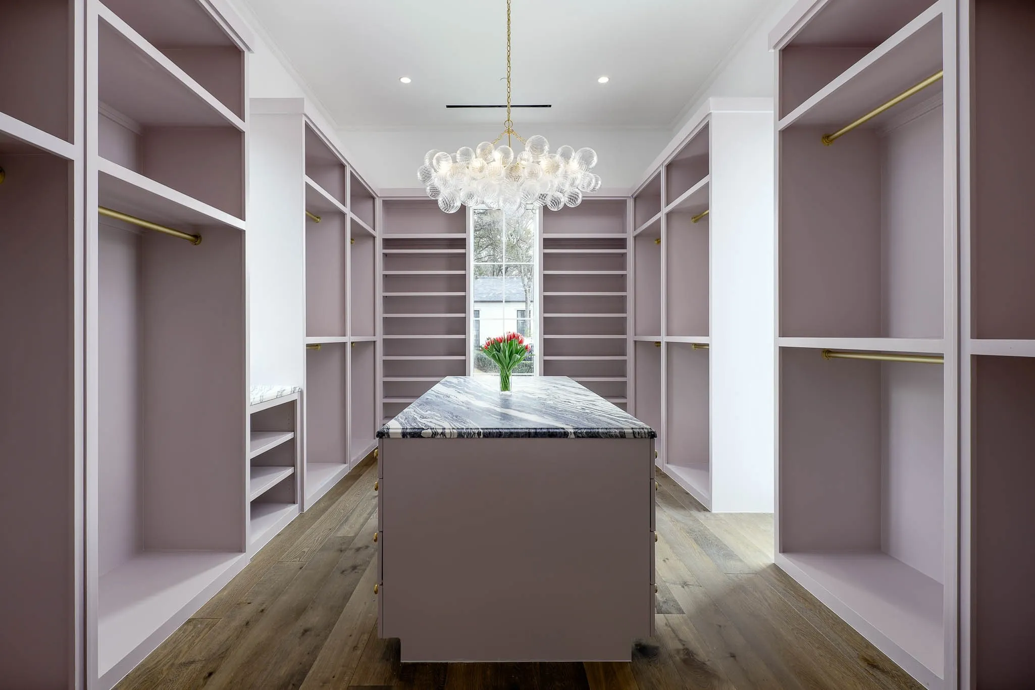 1 of 2 boutique style walk-in closets in Primary Suite
