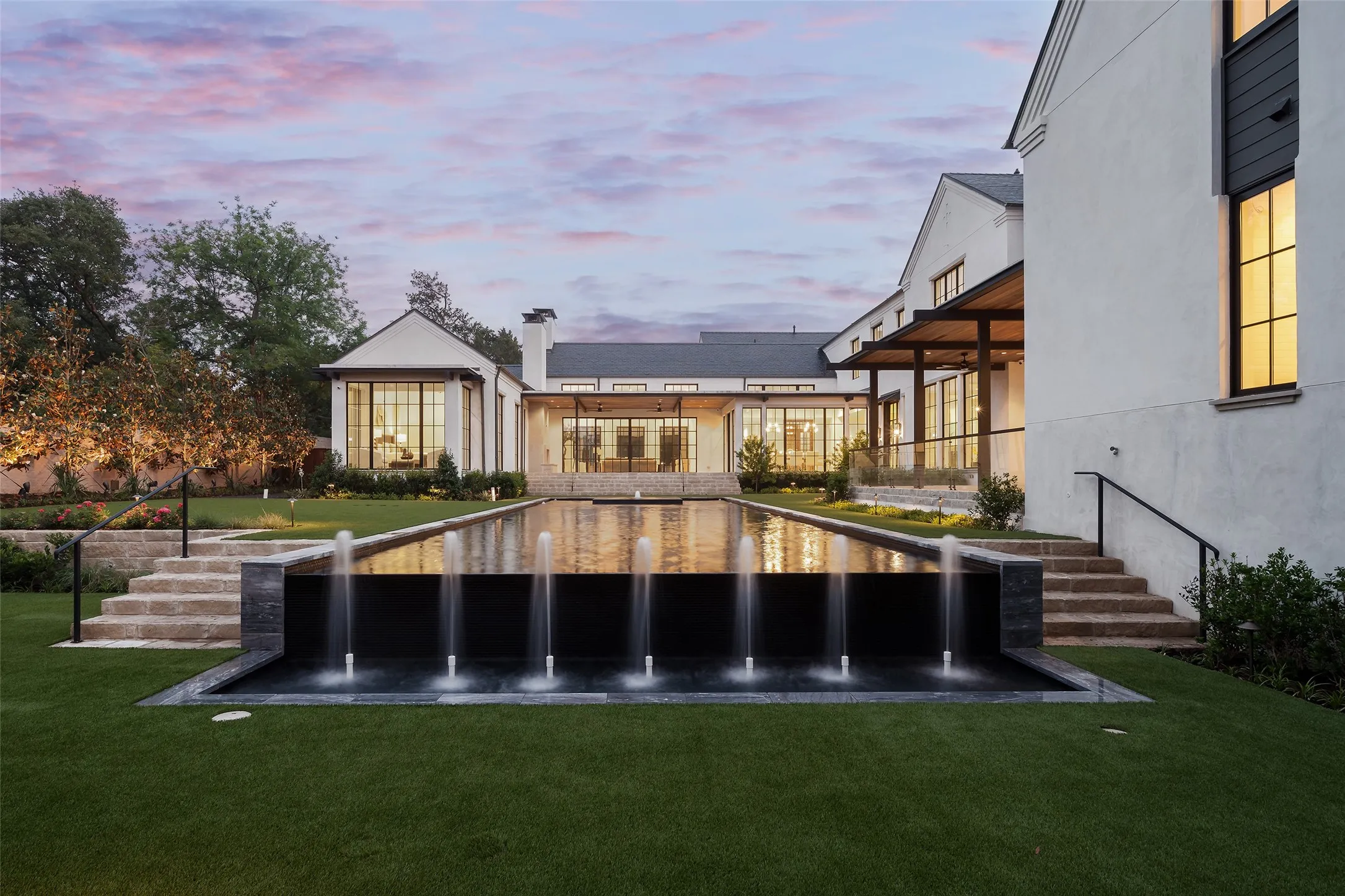 Infinity edge pool with water feature