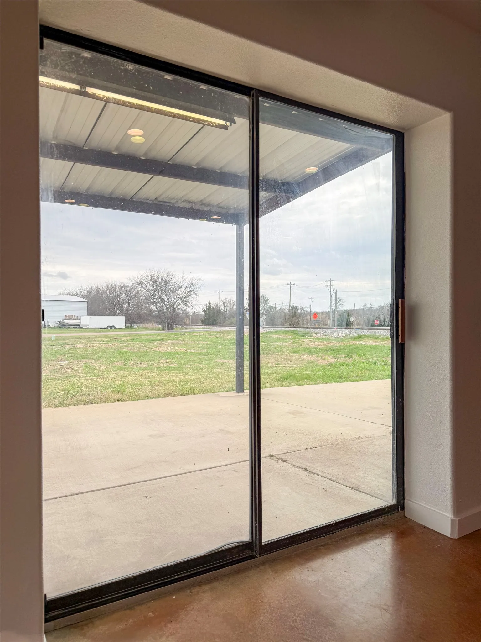 Sliding door with covered entry