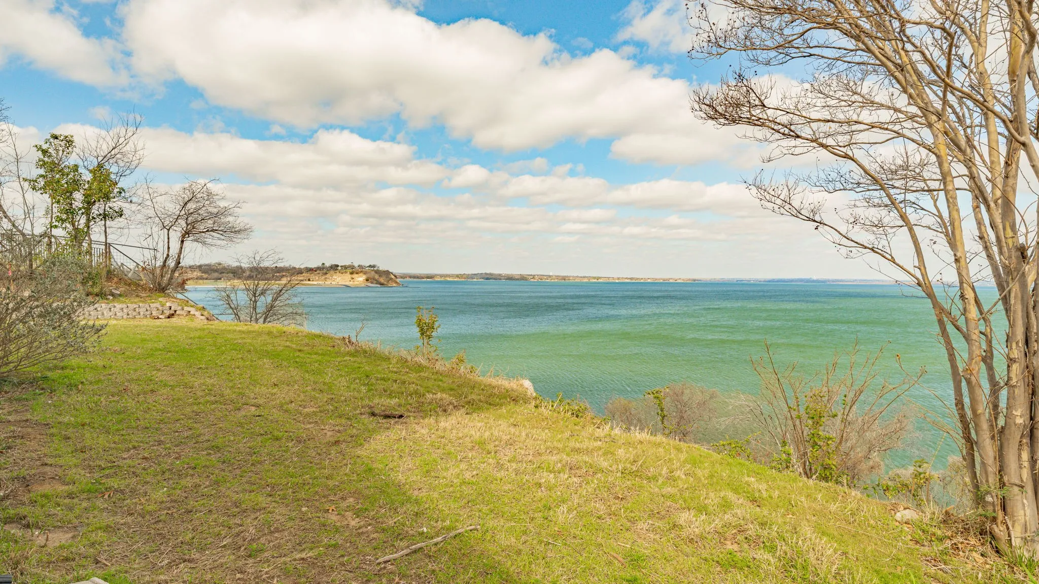Unimproved Land For Sale in Tarrant County , 8255 Eagle Mountain Circle, Fort Worth, Texas 76135, 0, 0, Garage spaces, 0 Sqft, built in 1969, mls#21197853, Real Estate Agent in Fort Worth, Homes For Sale in Tarrant county, Homes For Sale in Fort Worth, Realtor in Fort Worth Texas, Real Estate Brokerage Independent Realty Texas, Luminita Cordes Realtor