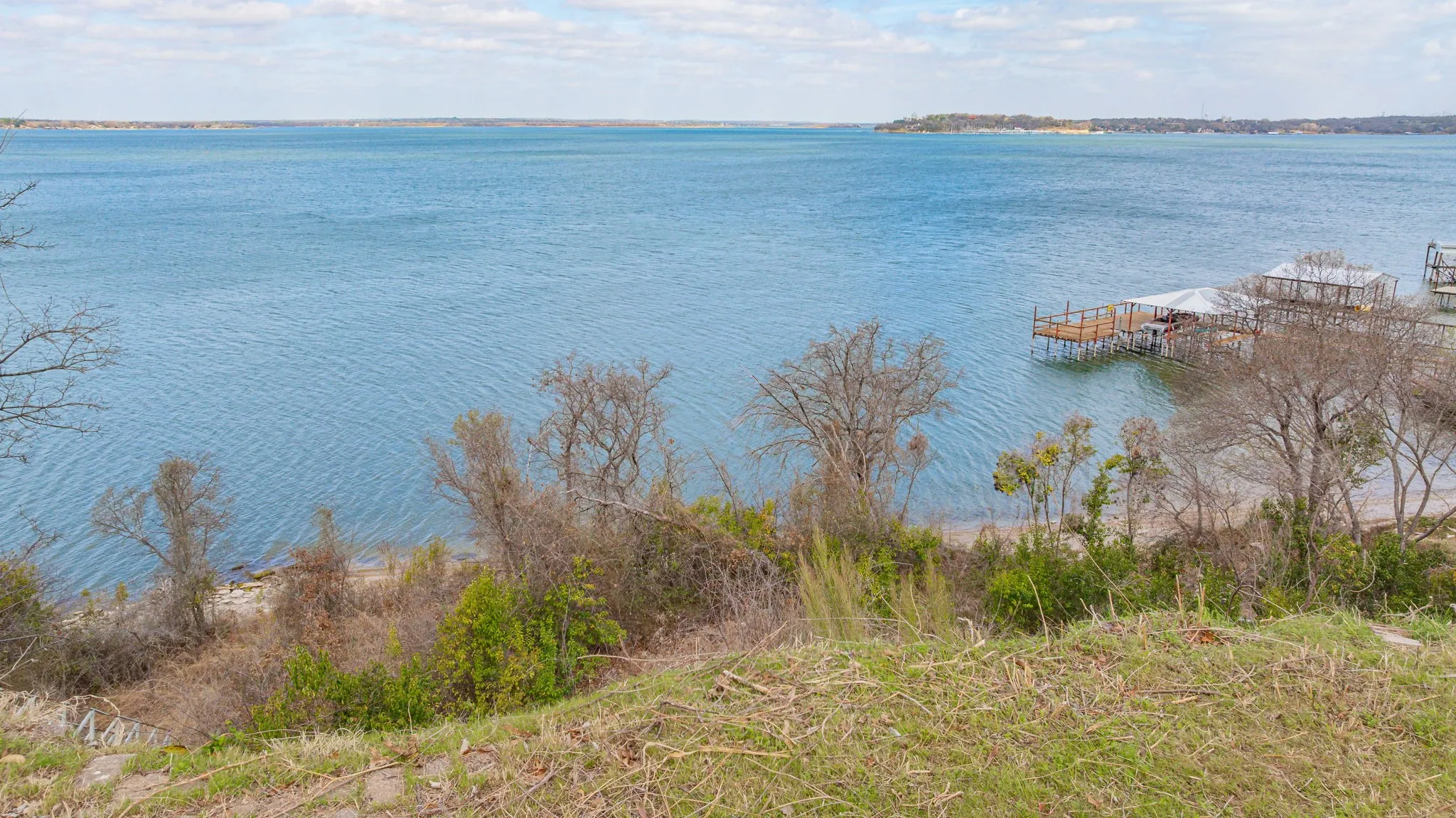 Unimproved Land For Sale in Tarrant County , 8255 Eagle Mountain Circle, Fort Worth, Texas 76135, 0, 0, Garage spaces, 0 Sqft, built in 1969, mls#21197853, Real Estate Agent in Fort Worth, Homes For Sale in Tarrant county, Homes For Sale in Fort Worth, Realtor in Fort Worth Texas, Real Estate Brokerage Independent Realty Texas, Luminita Cordes Realtor