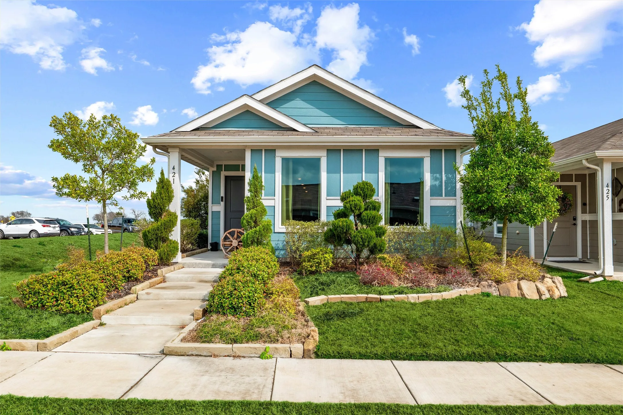 Bungalow-style house featuring a front lawn