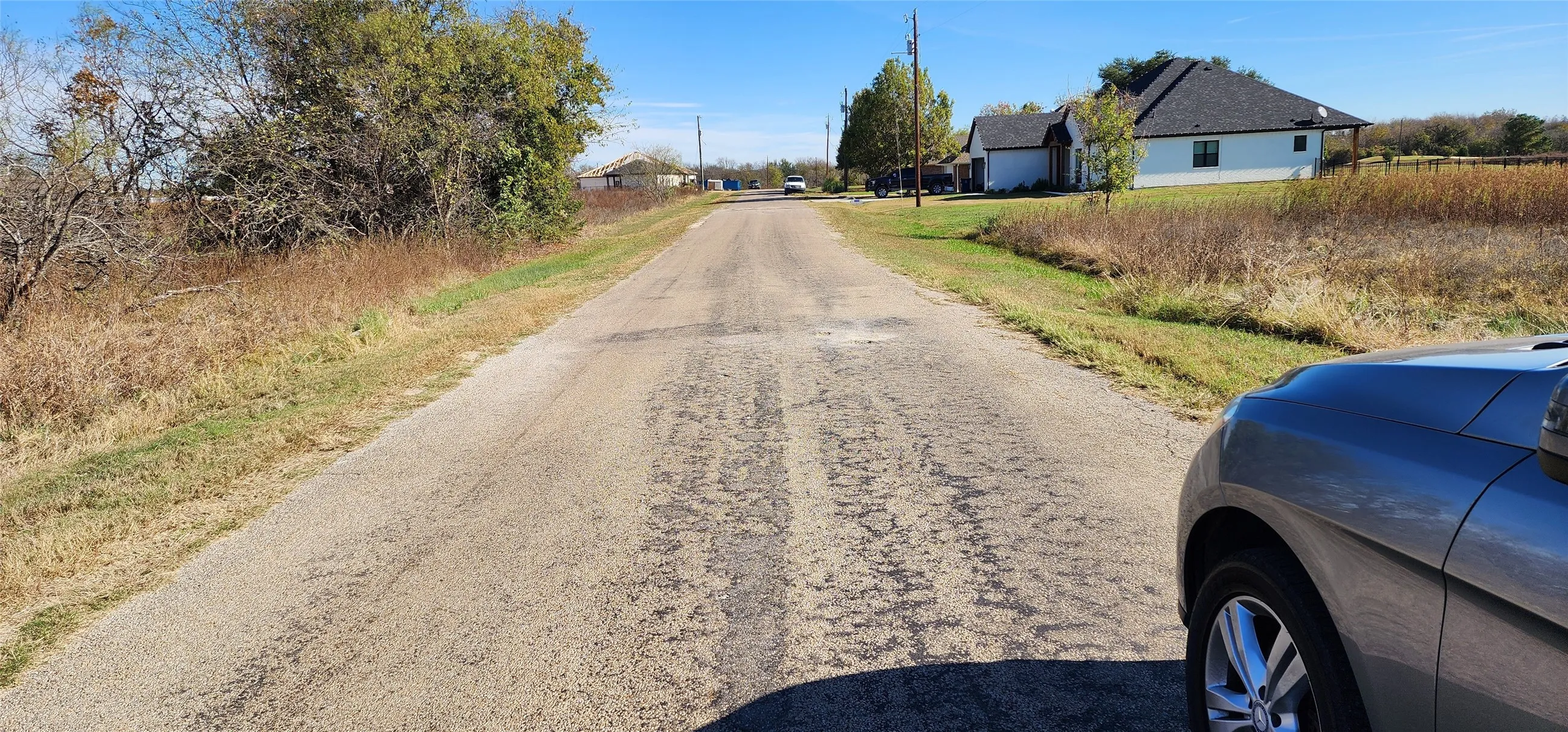 View down the road from the lot
