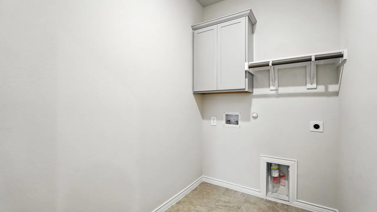 Laundry room with hookup for a gas dryer, cabinet space, electric dryer hookup, and washer hookup