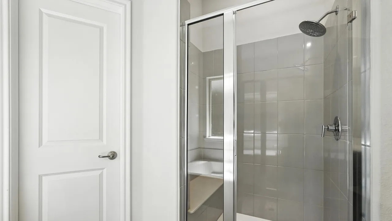 Bathroom featuring a shower stall