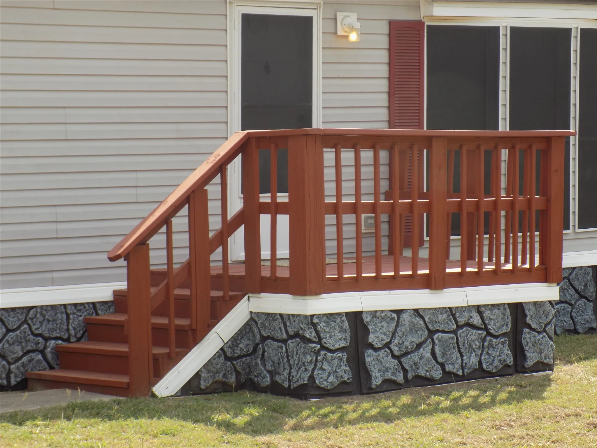 Deck at front door.