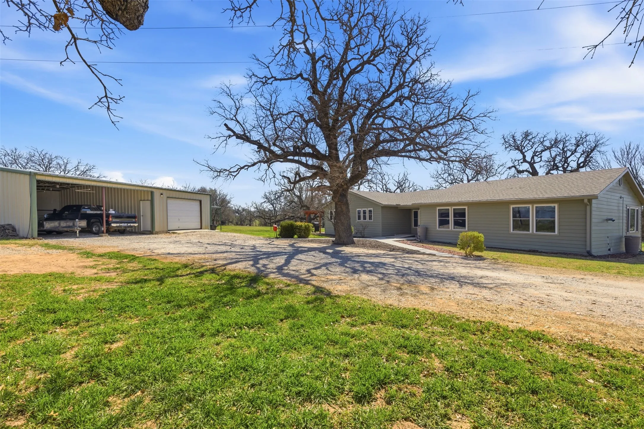 Carport and shop near front