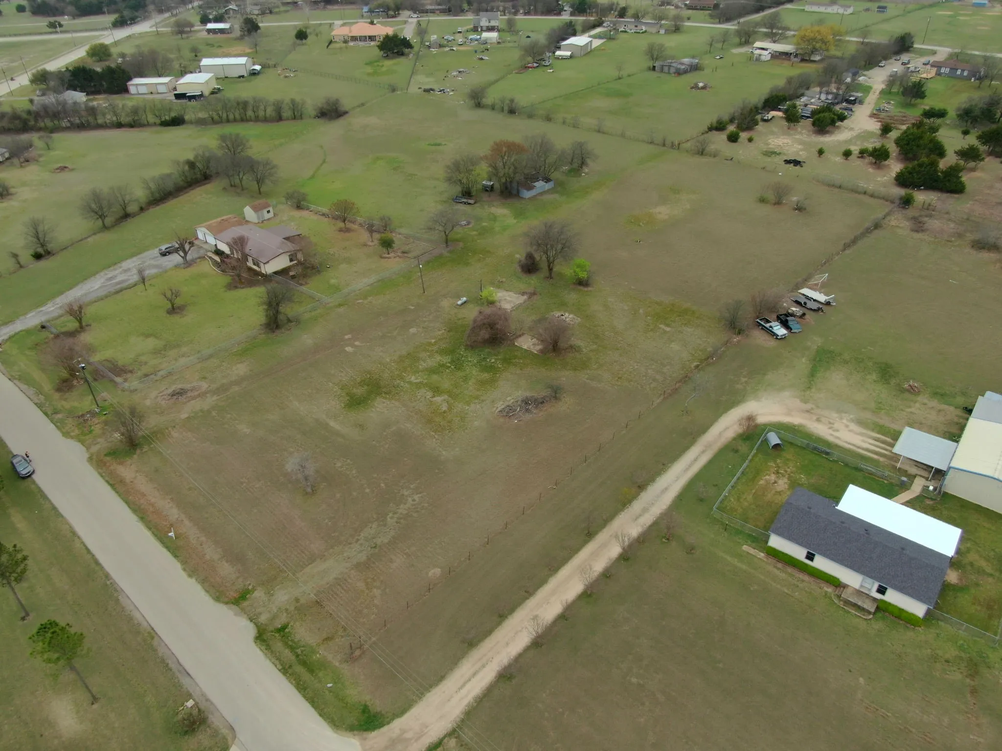 Aerial view of property's location featuring rural landscape