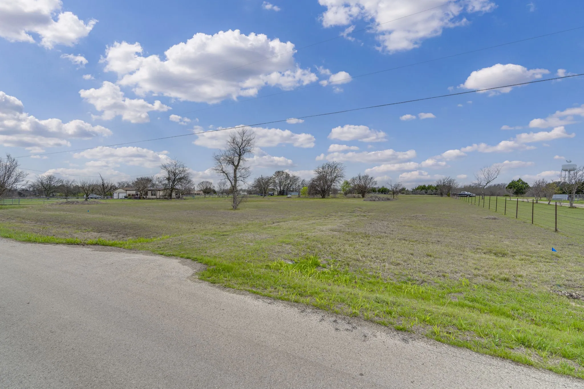 View of asphalt street with a view of countryside