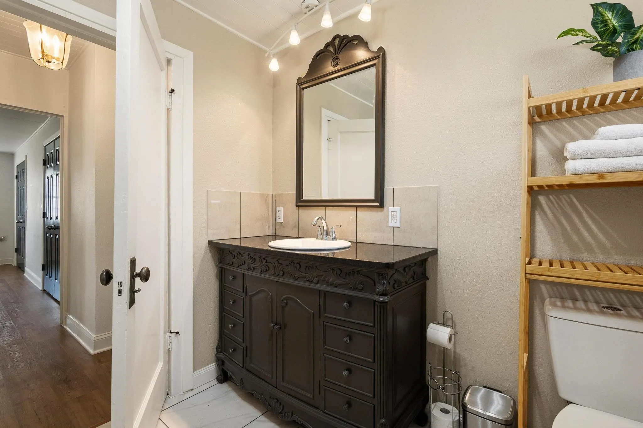 Shared bathroom with vanity