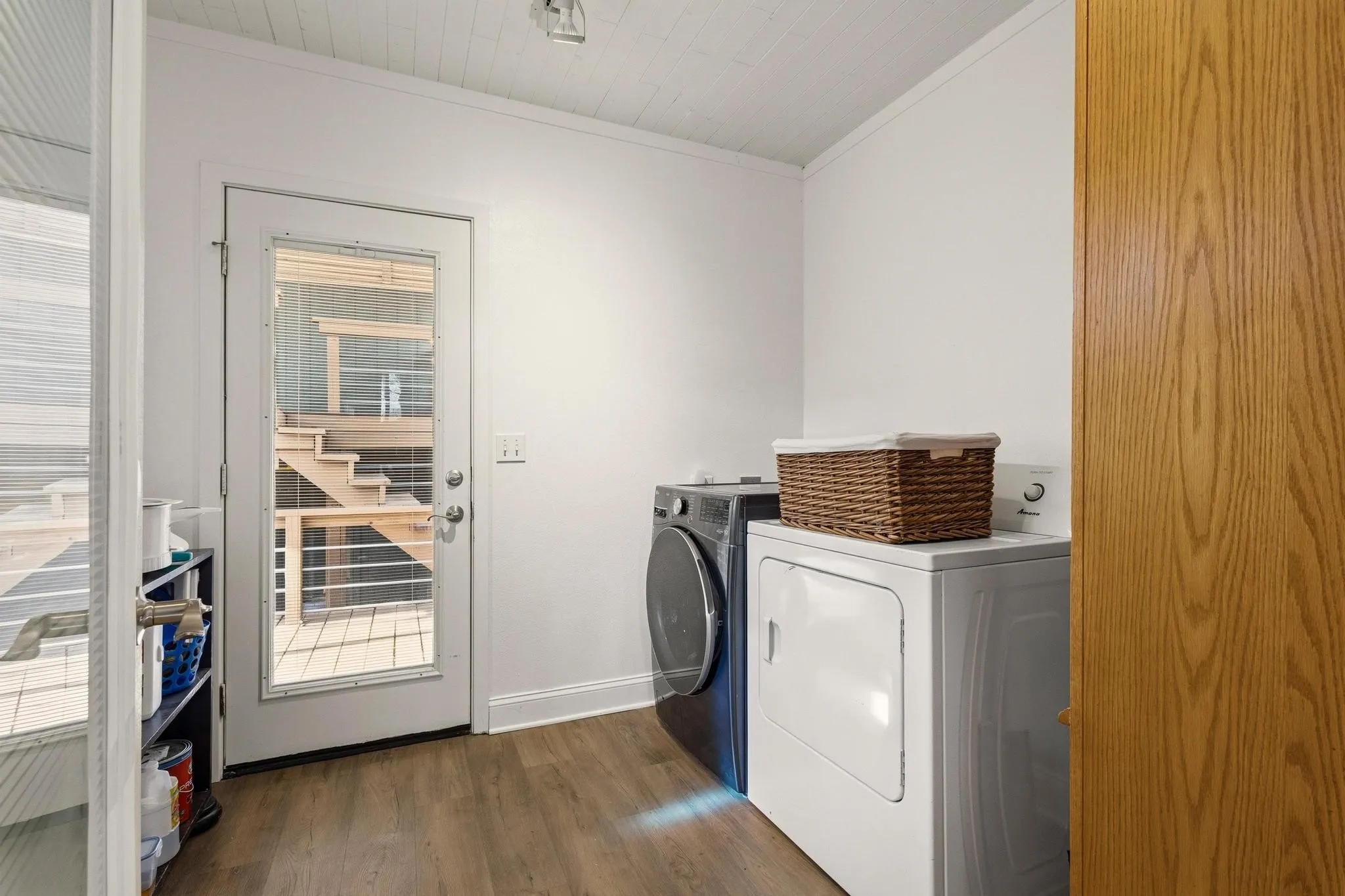 Laundry room with shelf storage