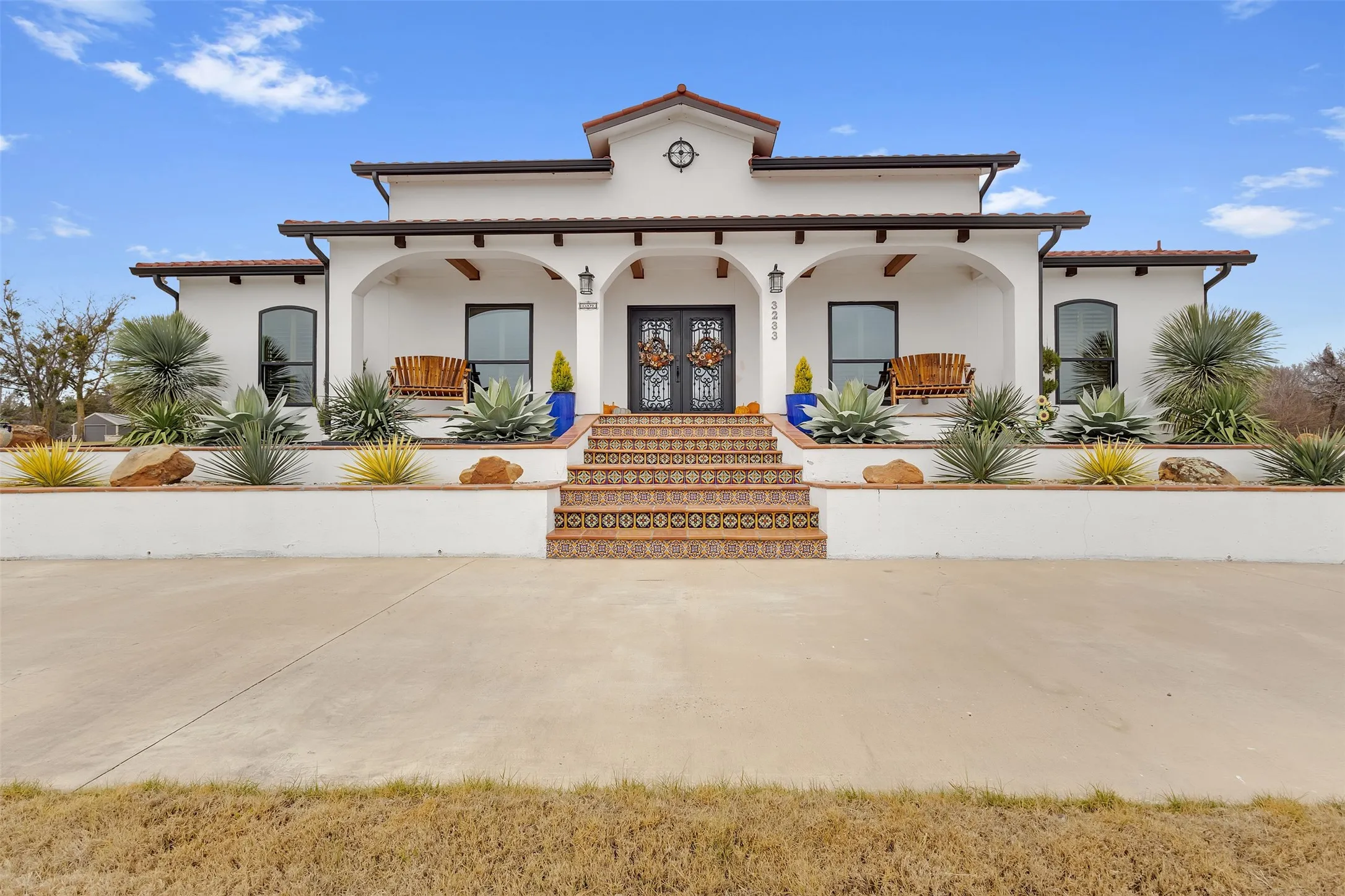 THE BEAUTIFUL FRONT ELEVATION LANDSCAPING