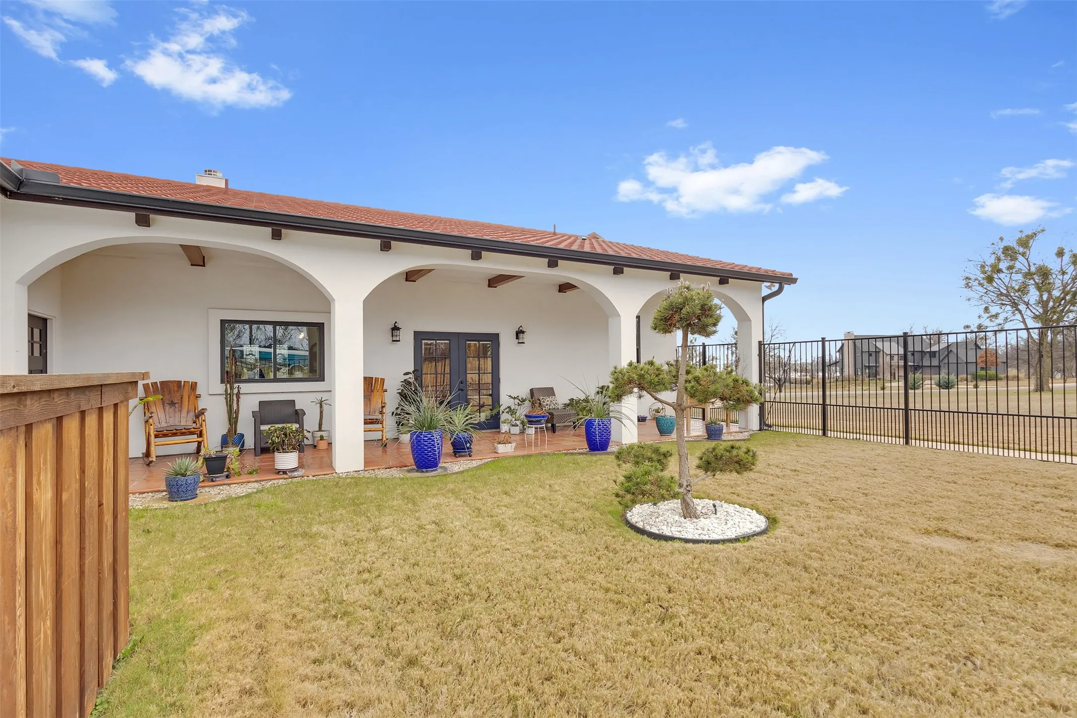 ANOTHER VIEW OF THE BACK COVERED PATIO