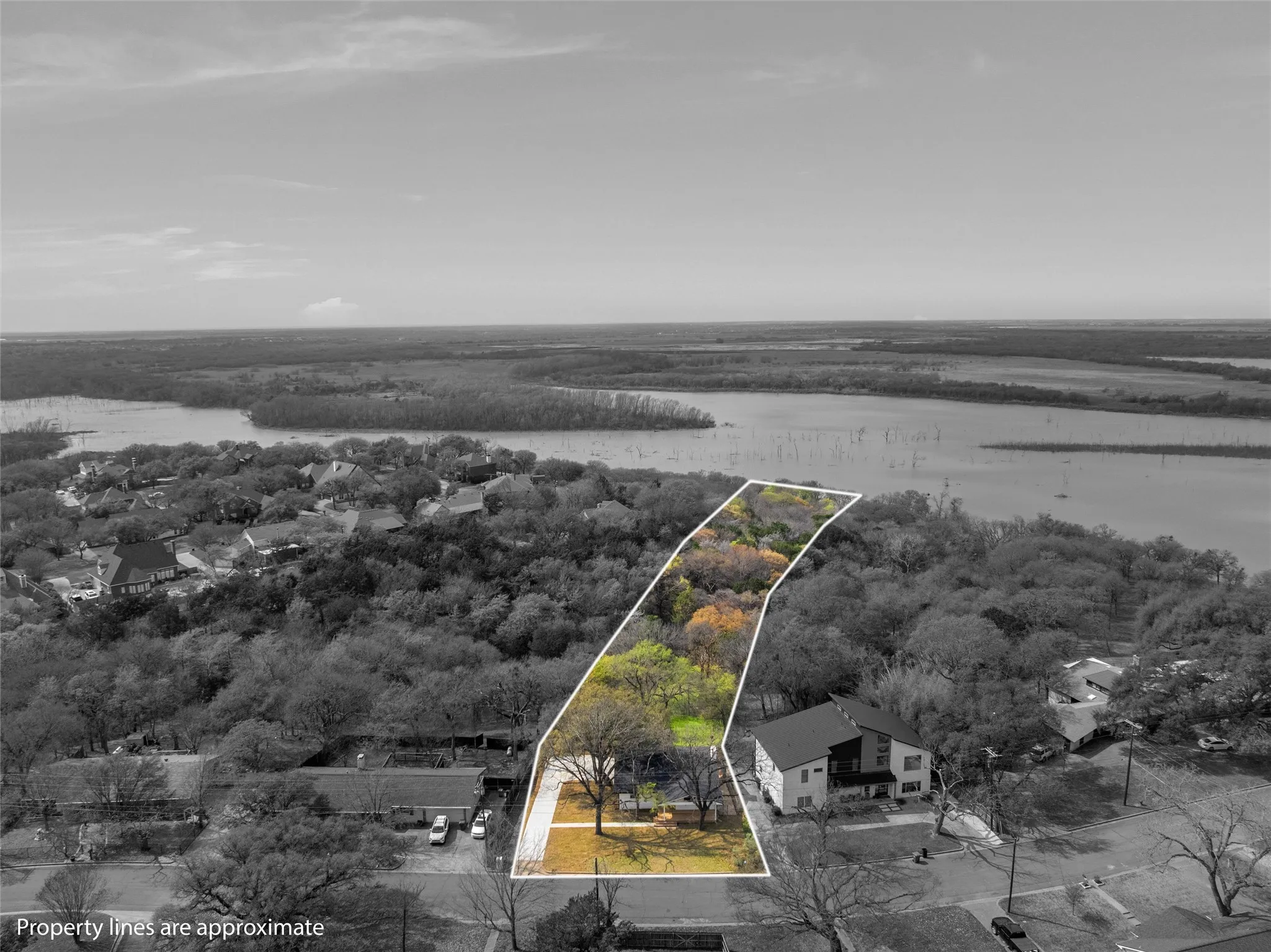 Property view looking back toward house form the lake