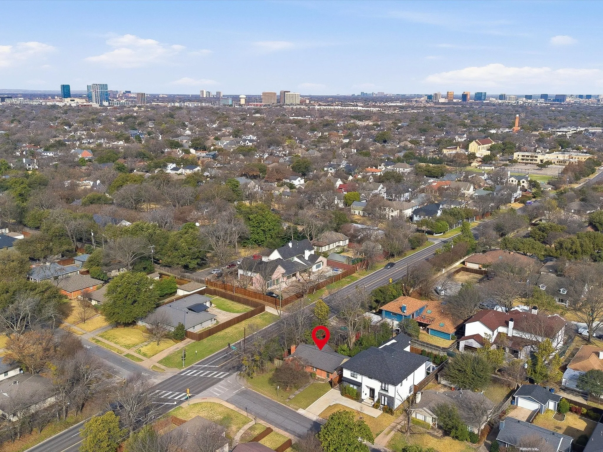 Aerial view of property and surrounding area with nearby urban area and nearby suburban area