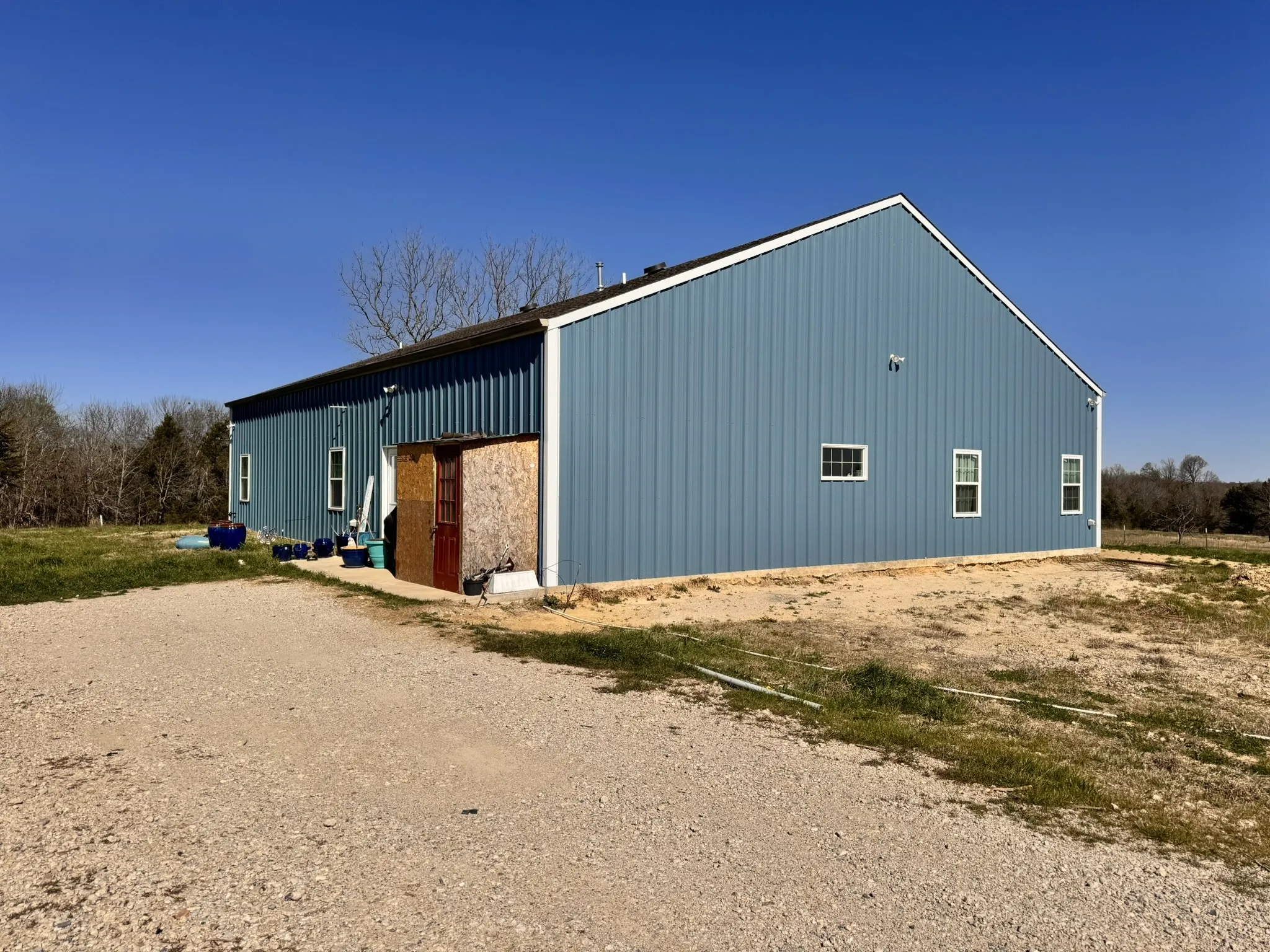 View of outdoor structure featuring an outbuilding