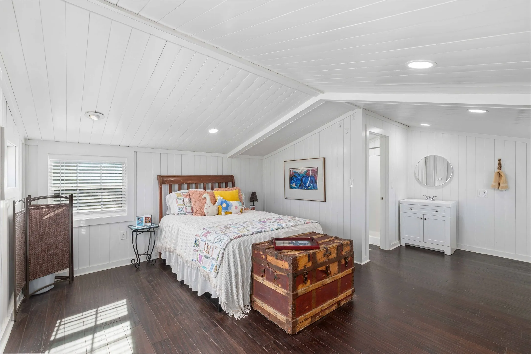 Guest Bedroom on top of barn featuring recessed lighting, dark wood-style flooring, and wood ceiling