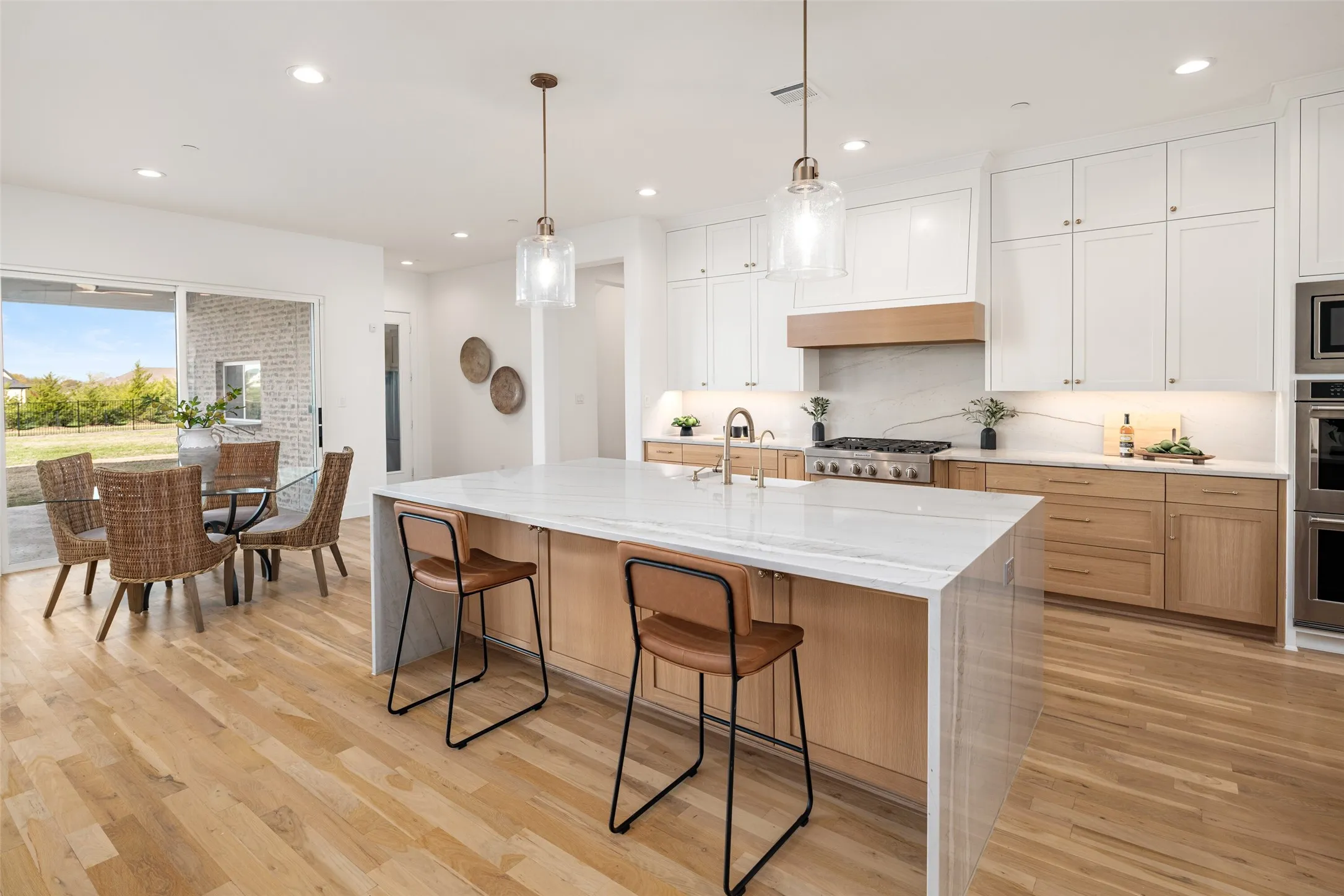 Waterfall island with storage and designer pendant lights