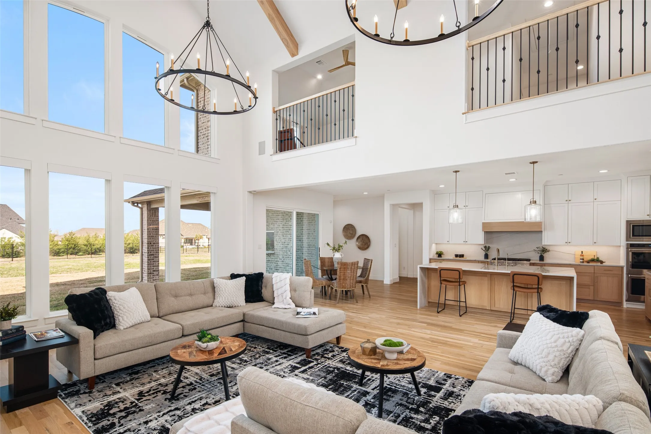 Vaulted living room ceiling with 7 white oak beams.