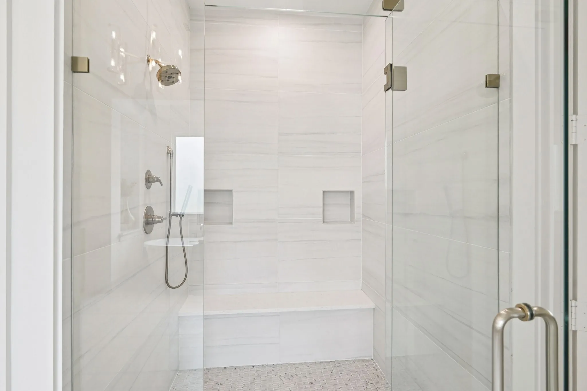 Stunning huge shower with rainfall shower head and bench