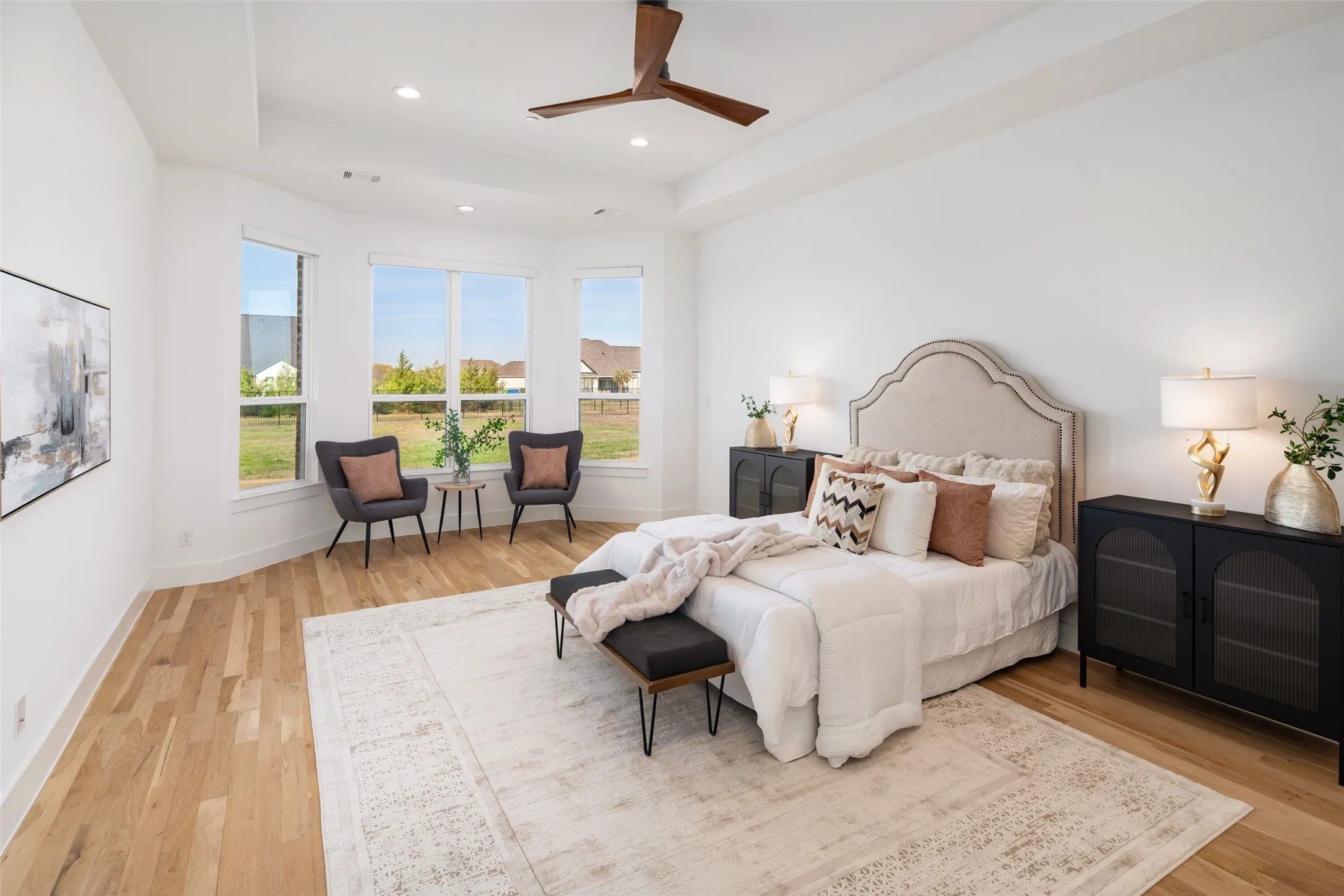 Remote controlled shades and gorgeous white oak floorings and picture frame ceiling