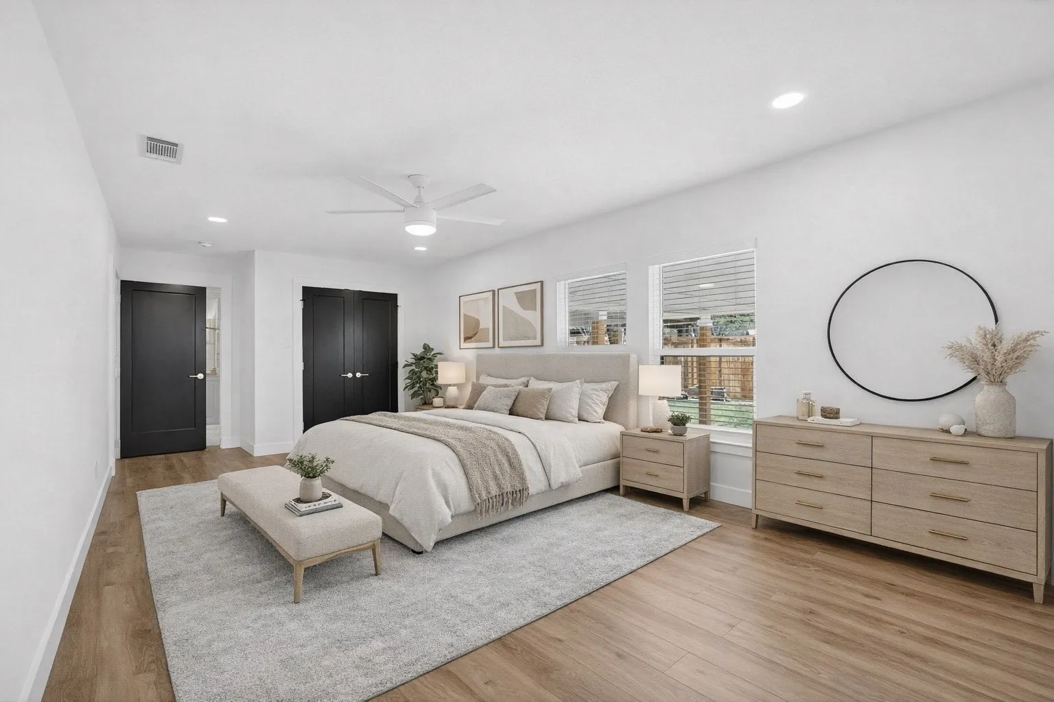 Digitally staged primary bedroom