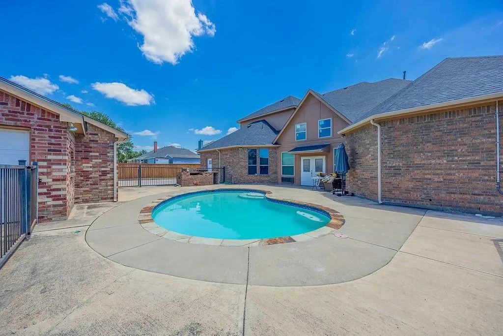 View of pool with patio surround