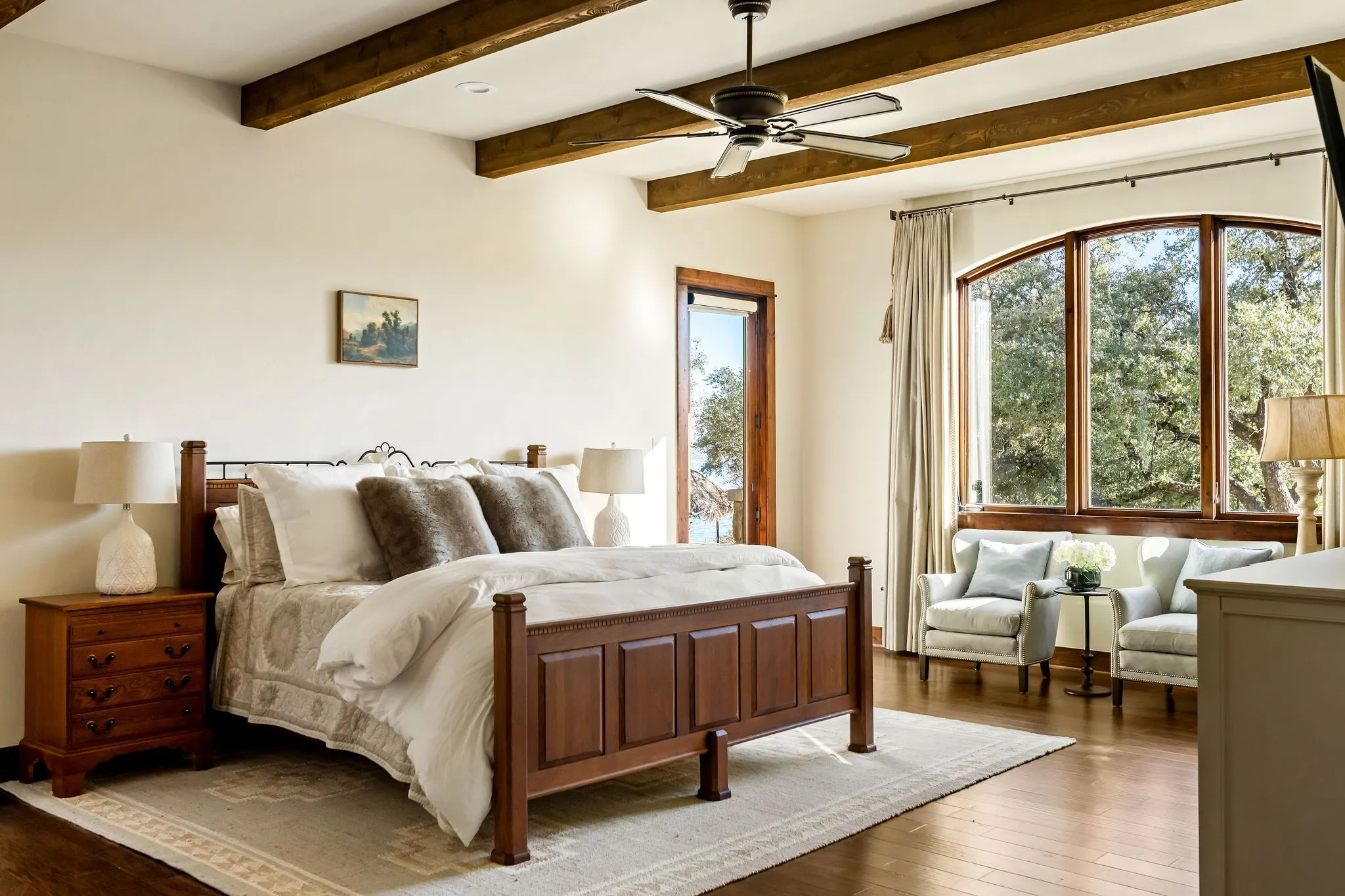 The primary bedroom in the main residence is a retreat in and of itself.