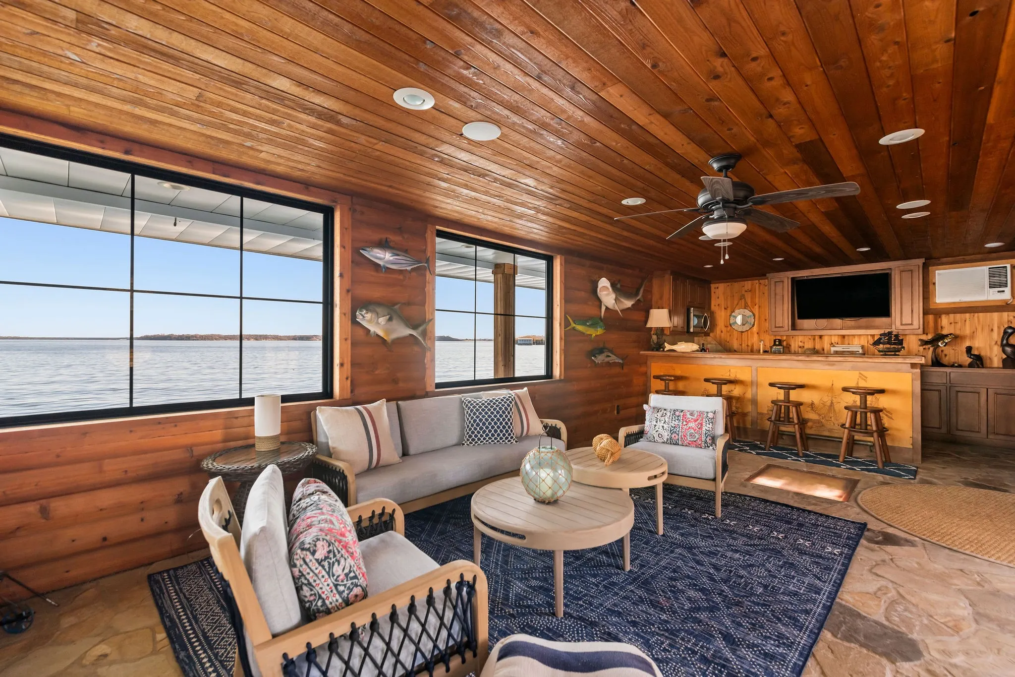 This dockside lounge provides a bar, indoor lounging, and breathtaking over the water views.