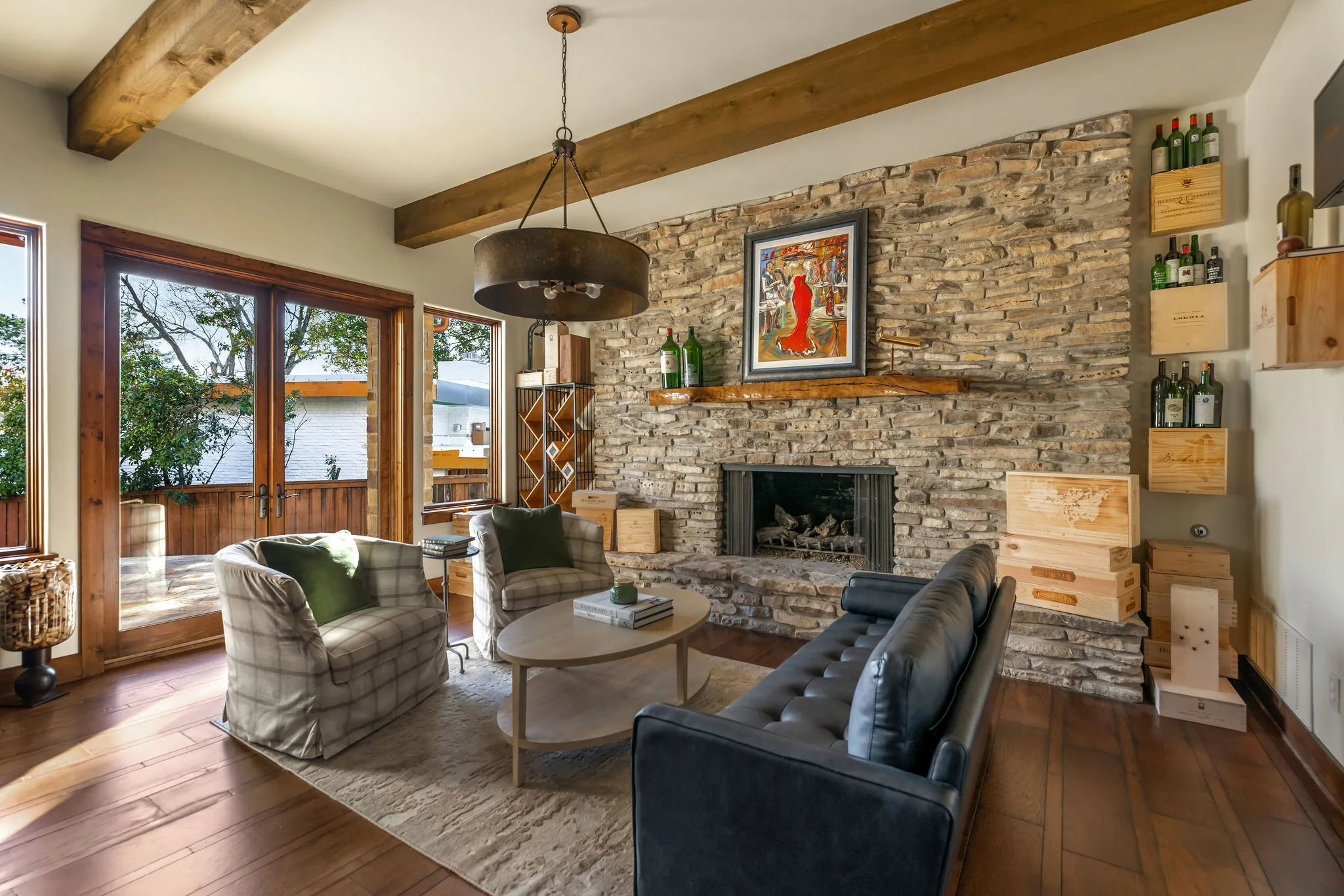Nestled behind the kitchen in the main house, this den include two large double doors leading you outside.