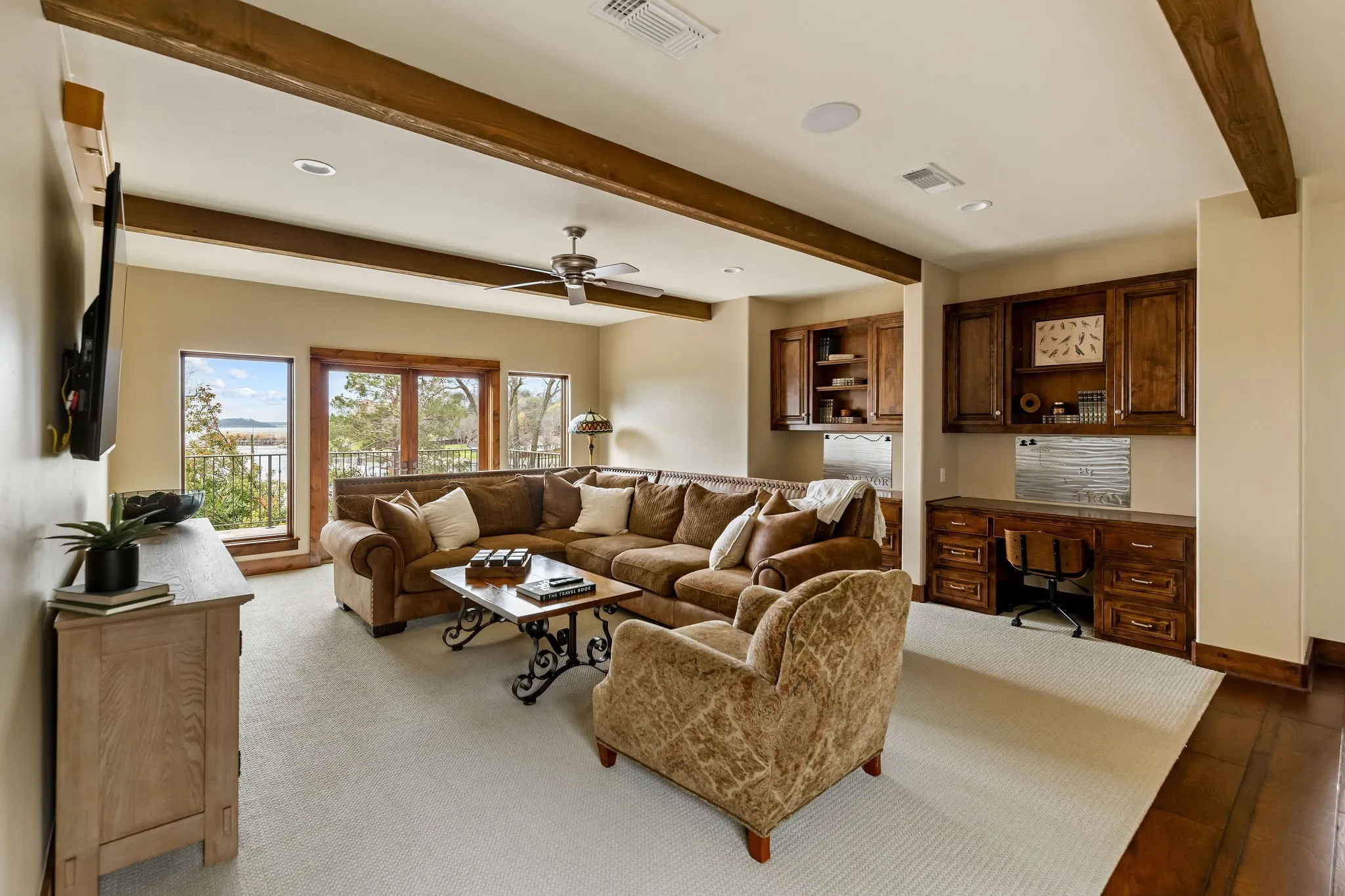 Located upstairs in the main house, this game room provides ample opportunity of design and function. The two double doors lead you to a balcony providing breathtaking views of Eagle Mountain Lake!